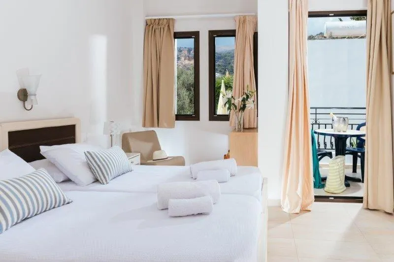 Bed in Paradise Hotel-Apartments