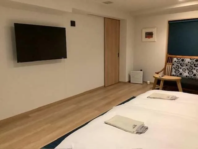 Bed in Awa Kanko Hotel