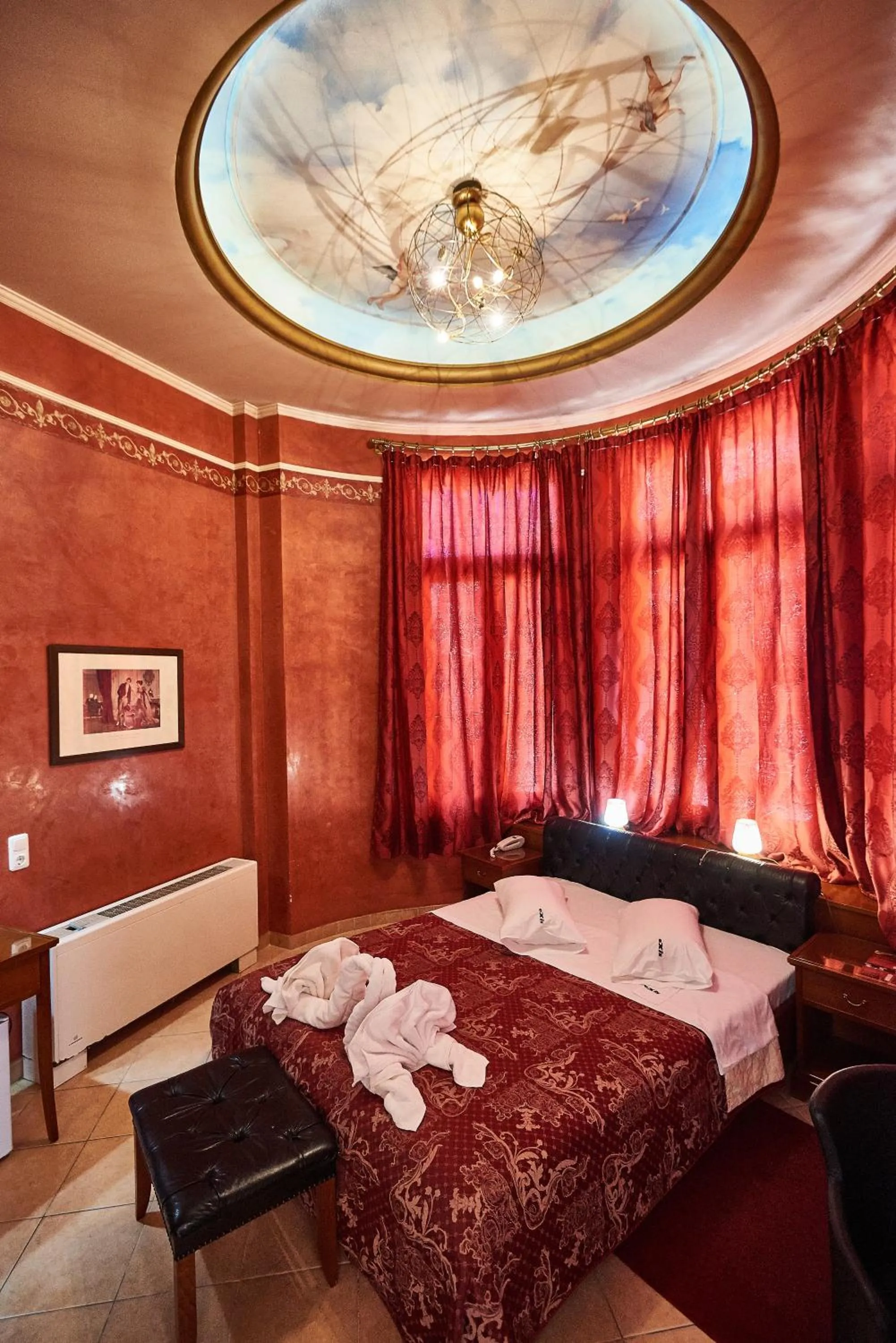 Living room, Bed in Exis Hotel