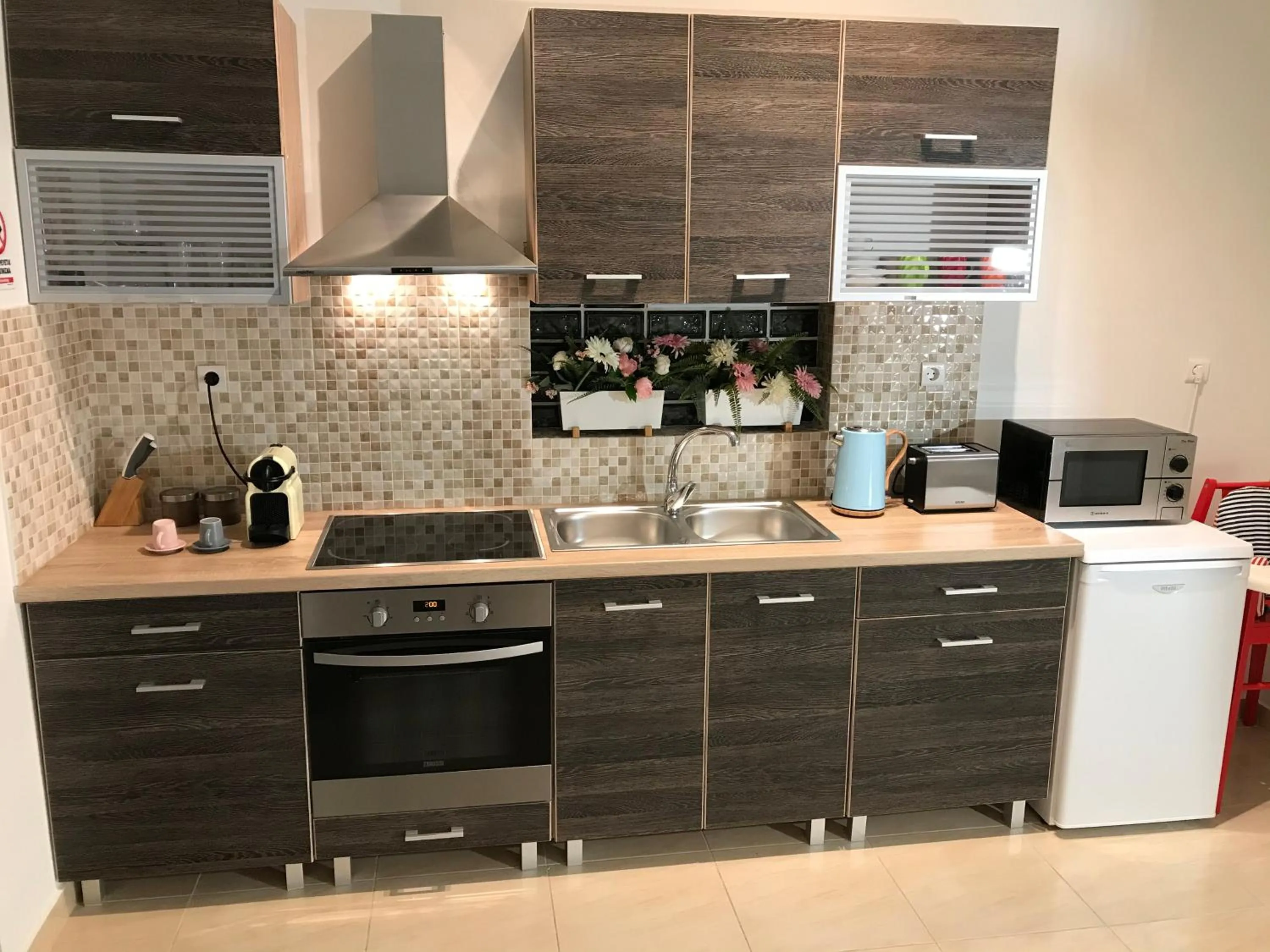 Kitchen or kitchenette in Dina's House