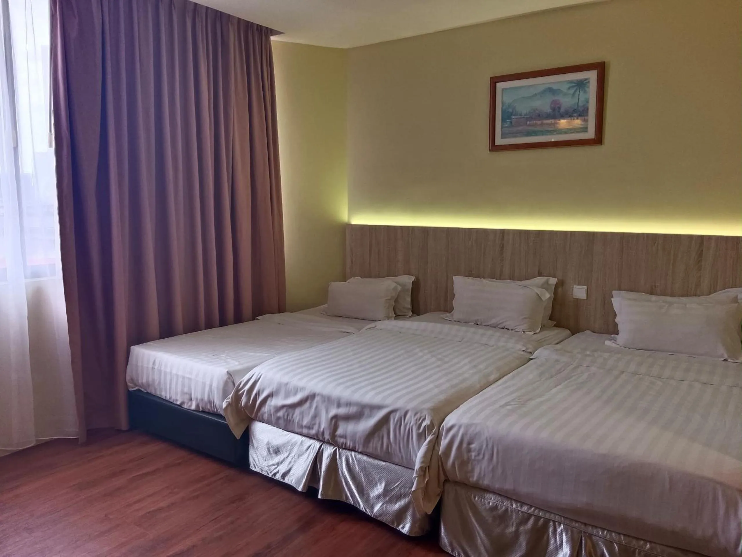 Bed in Gaya Centre Hotel