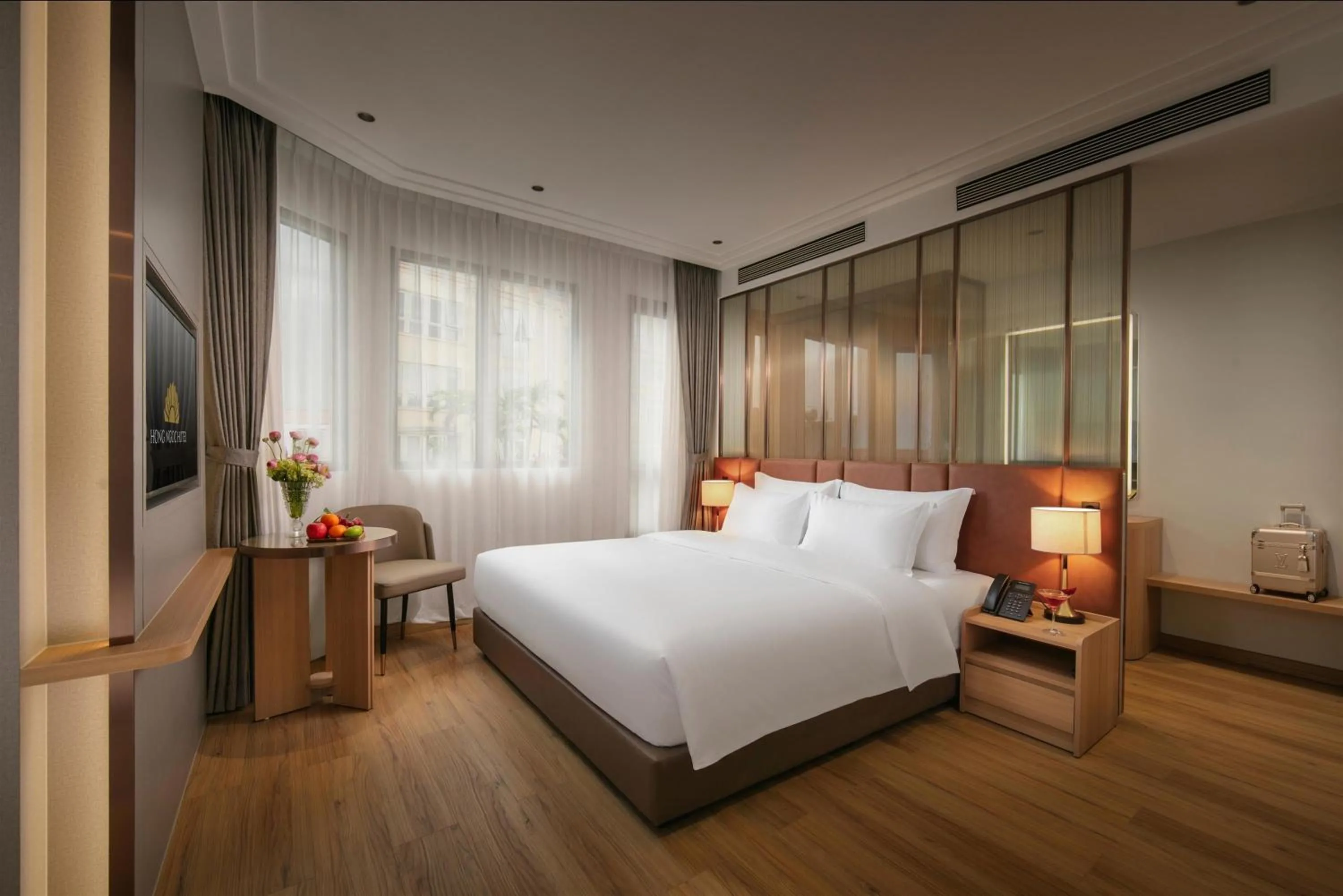 Photo of the whole room, Bed in Hong Ngoc Cochinchine Boutique Hotel & Spa