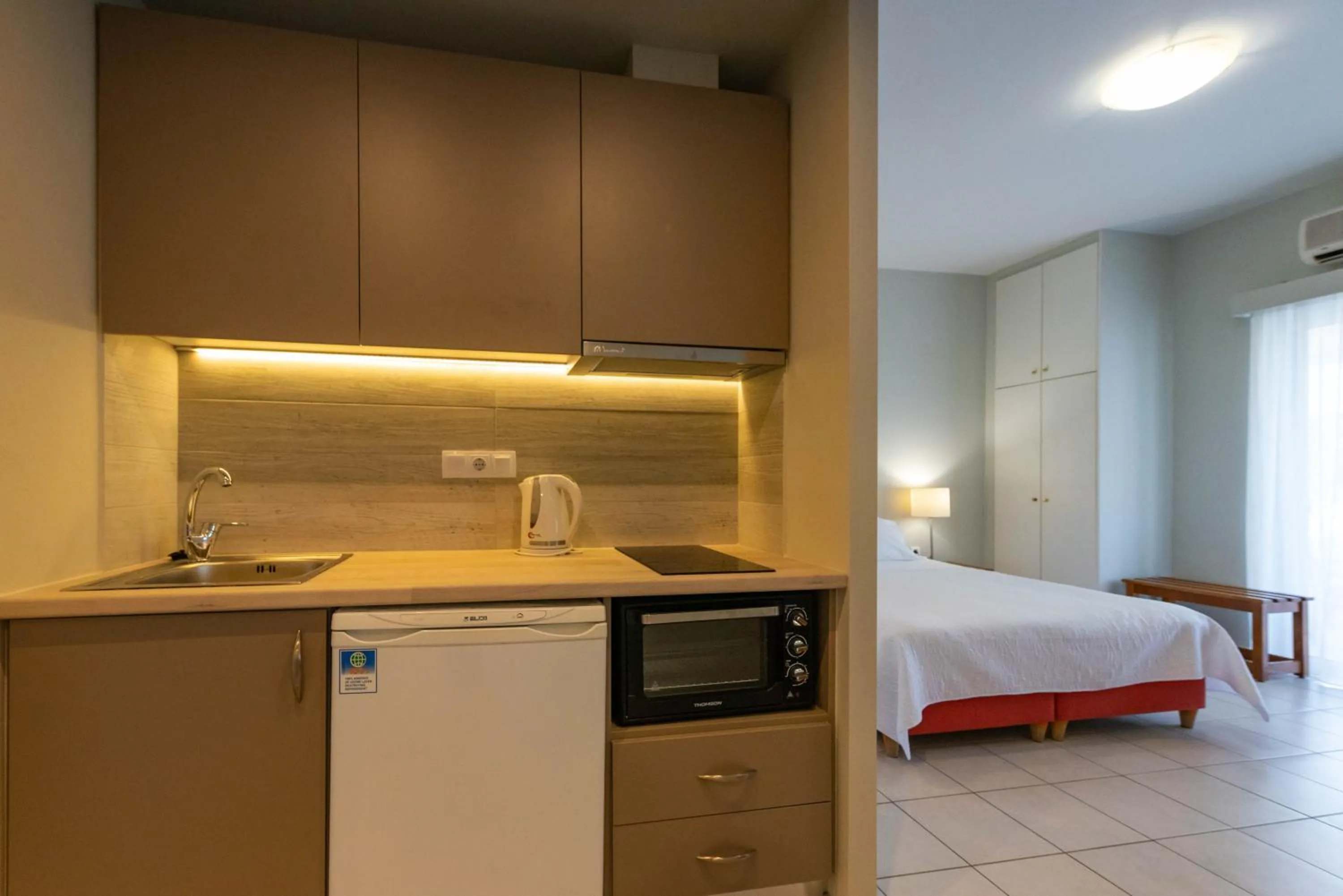 Bed in Theoxenia Hotel Apartments