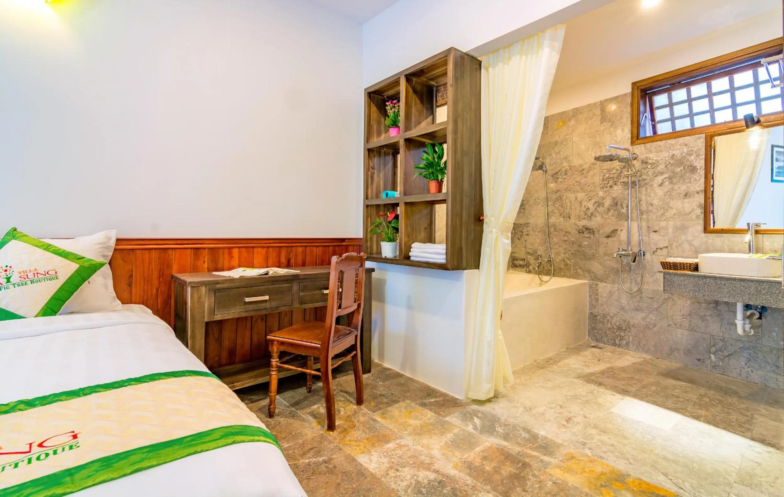 Photo of the whole room, Bed in Fig Tree Boutique Villa