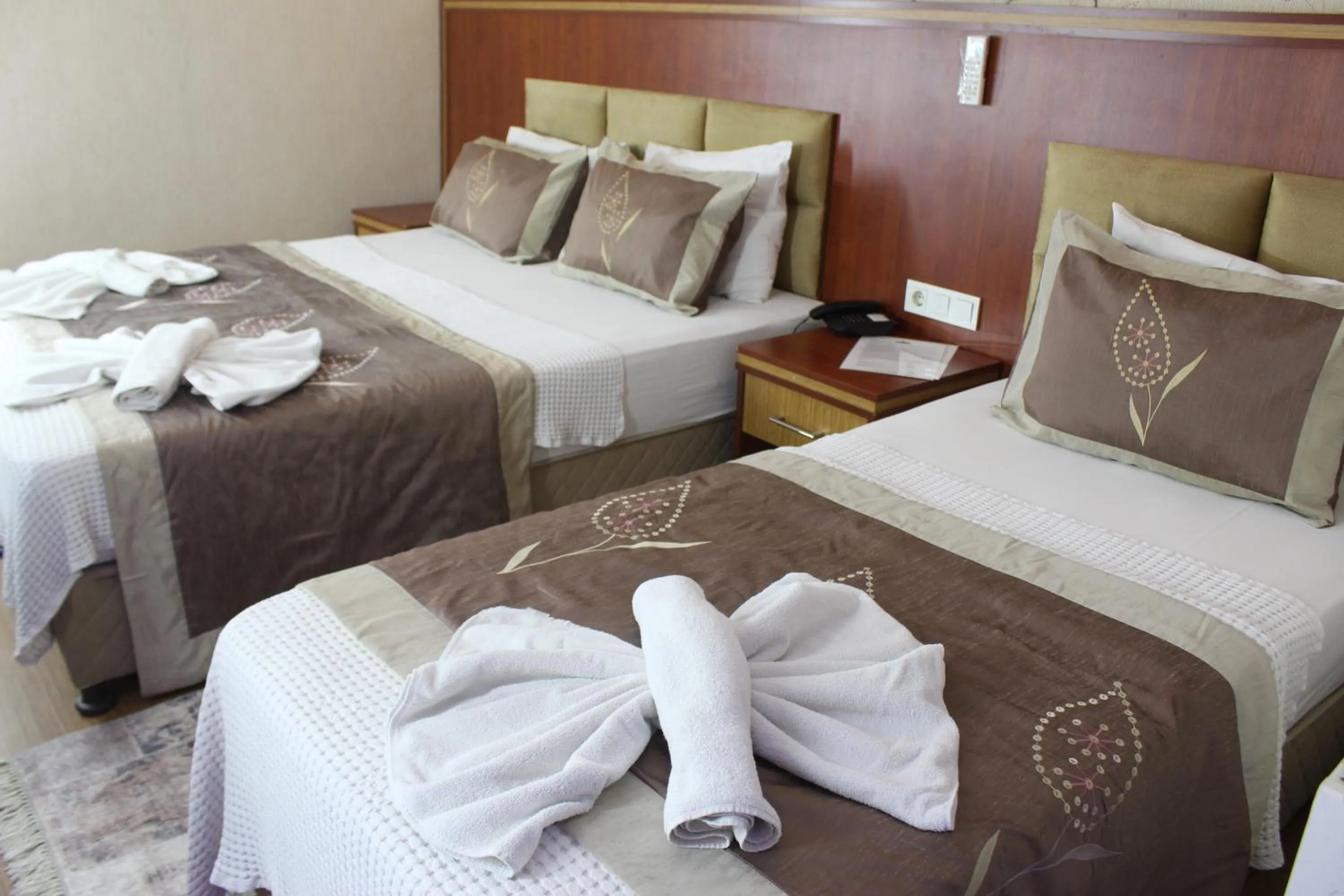 Bed in Hermanos Hotel