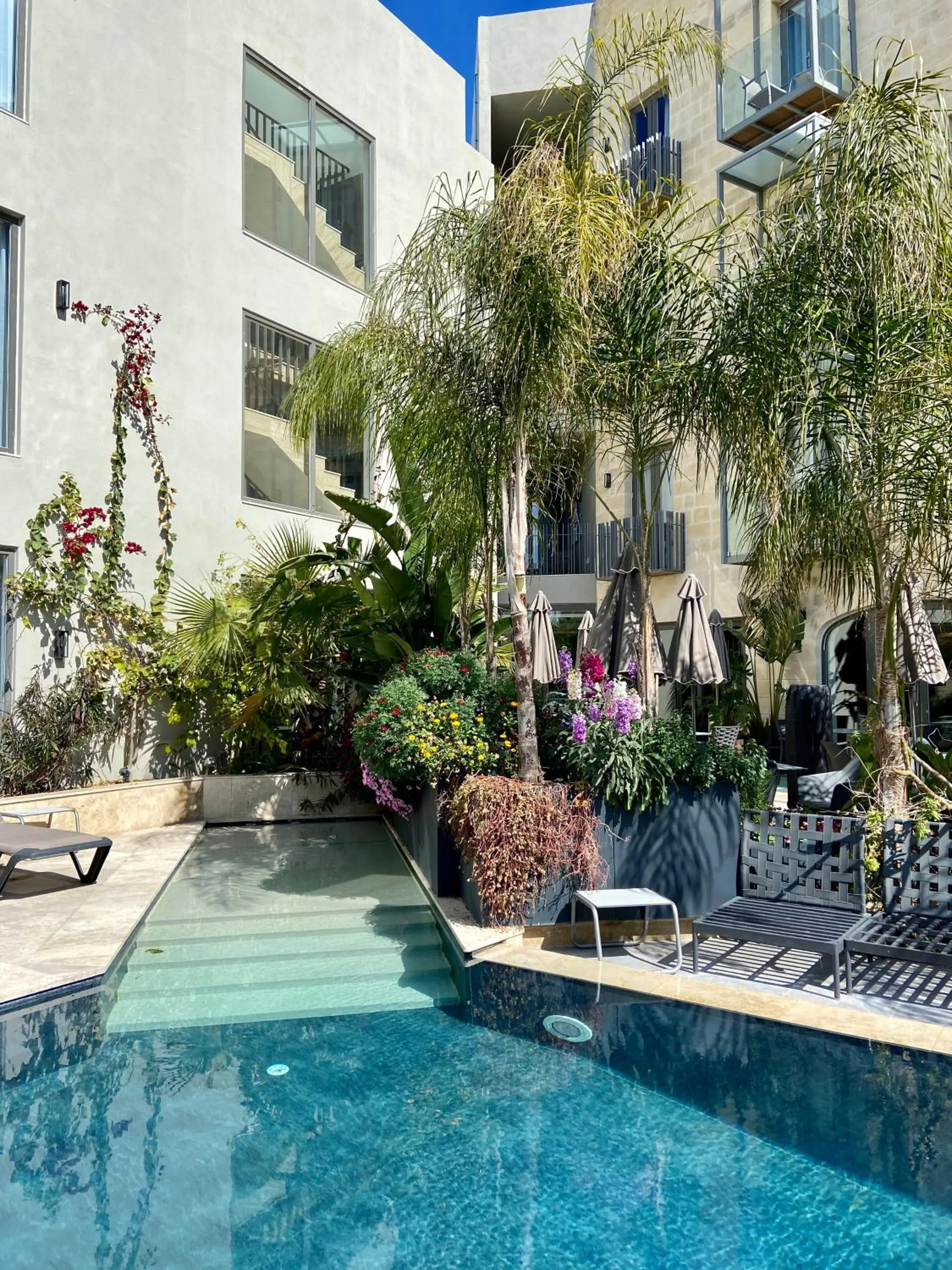Swimming pool in The Village Boutique and SPA