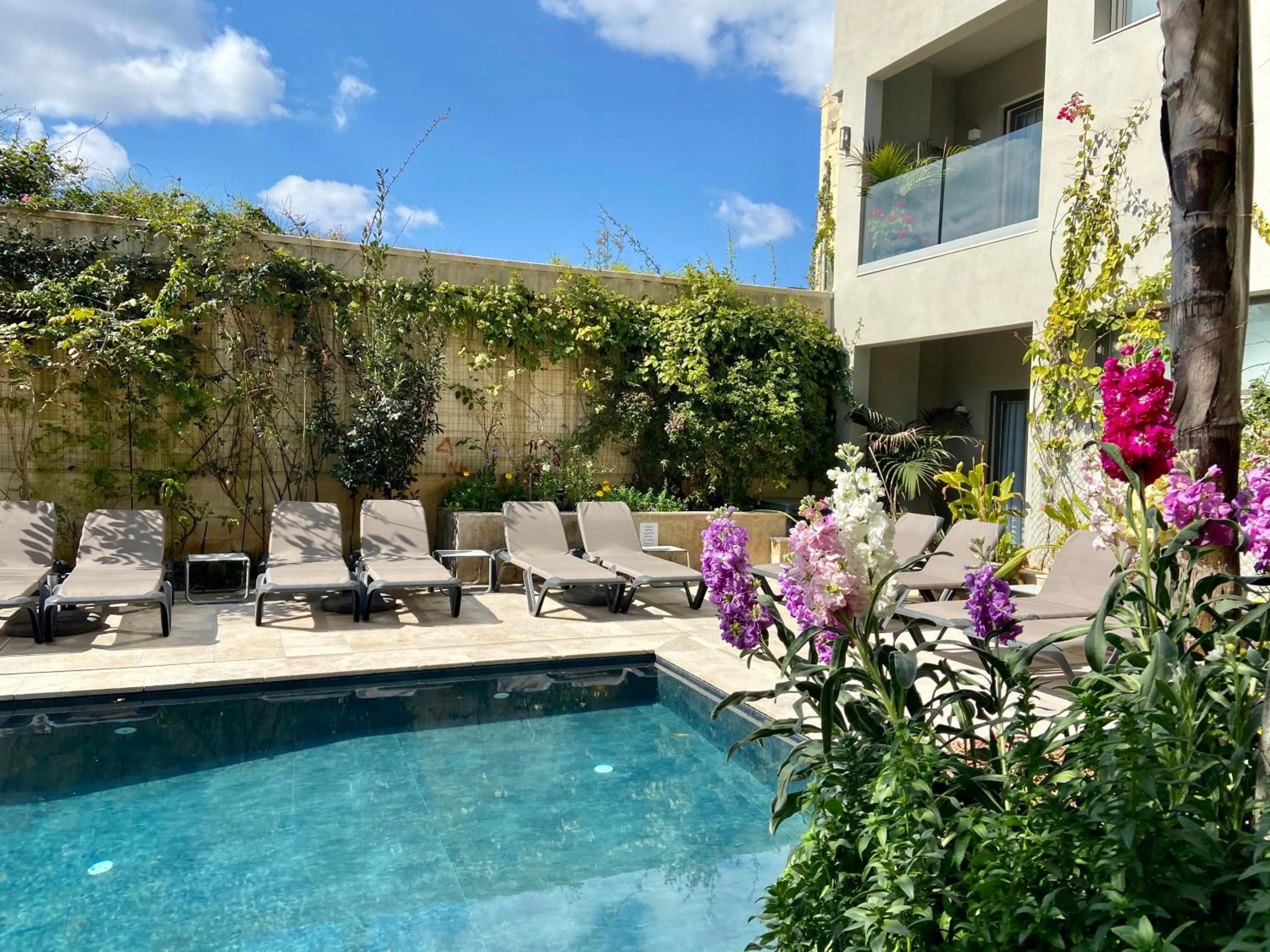 Swimming pool in The Village Boutique and SPA