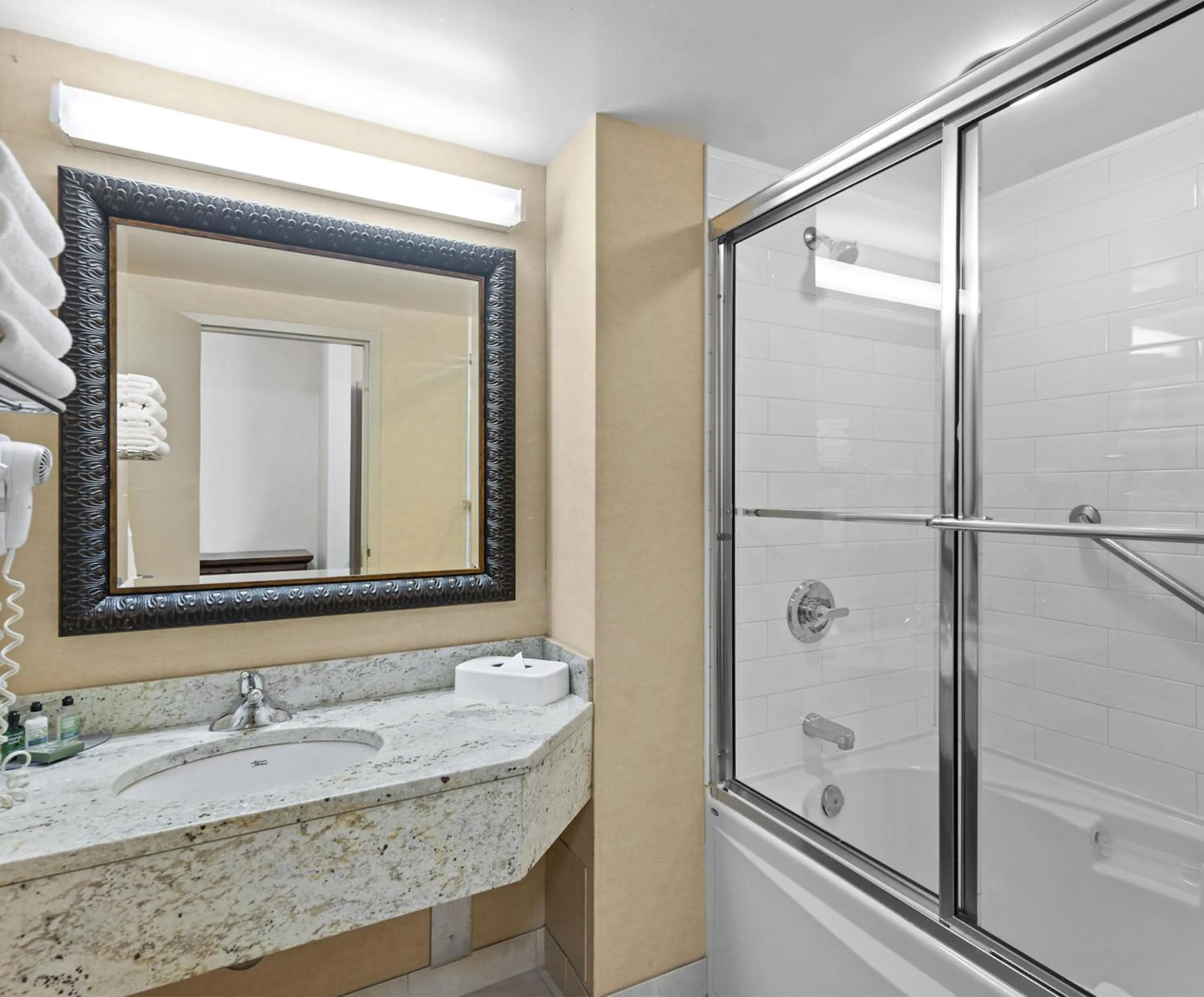 Shower in Travelodge Hotel by Wyndham Saskatoon