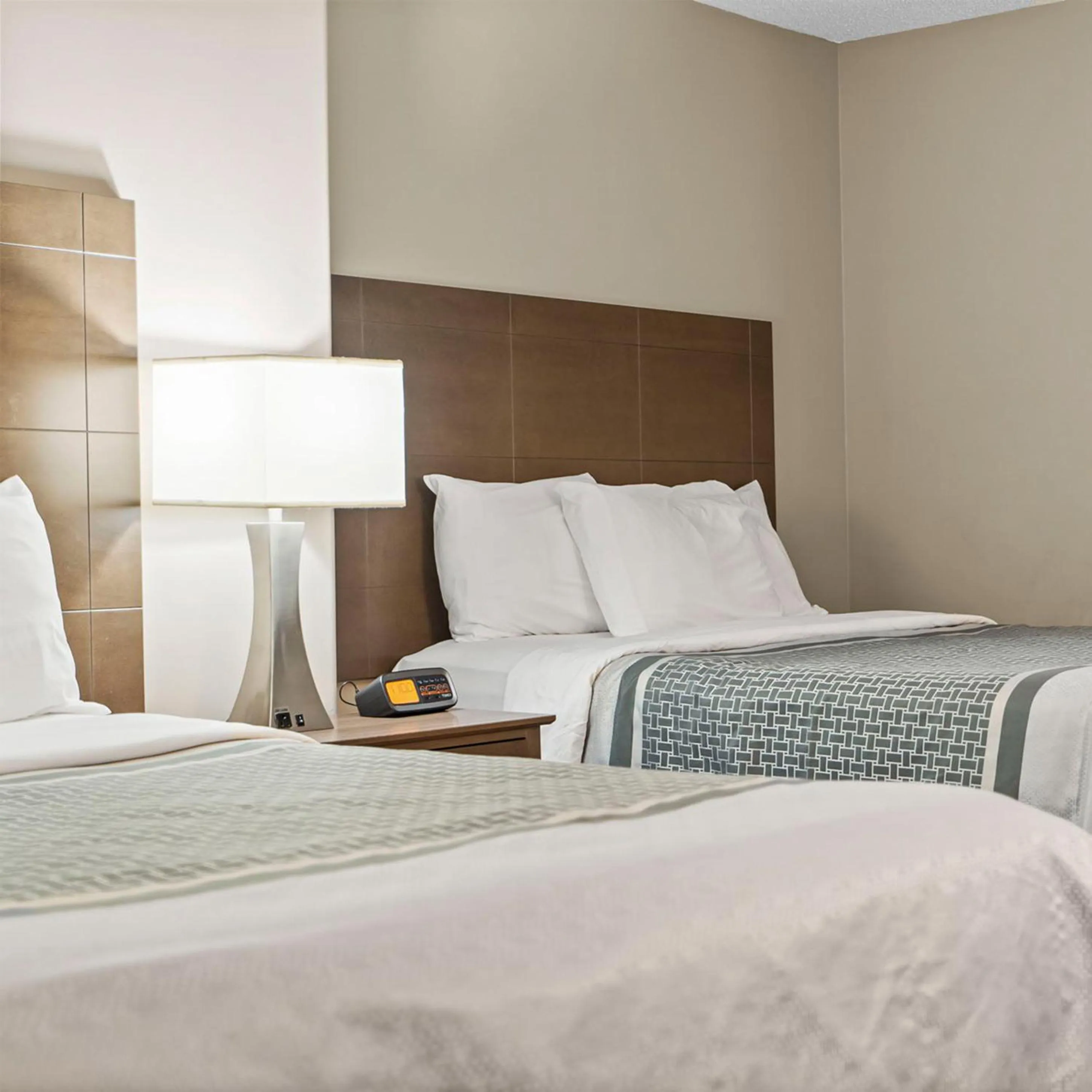 Bed in Travelodge Hotel by Wyndham Saskatoon