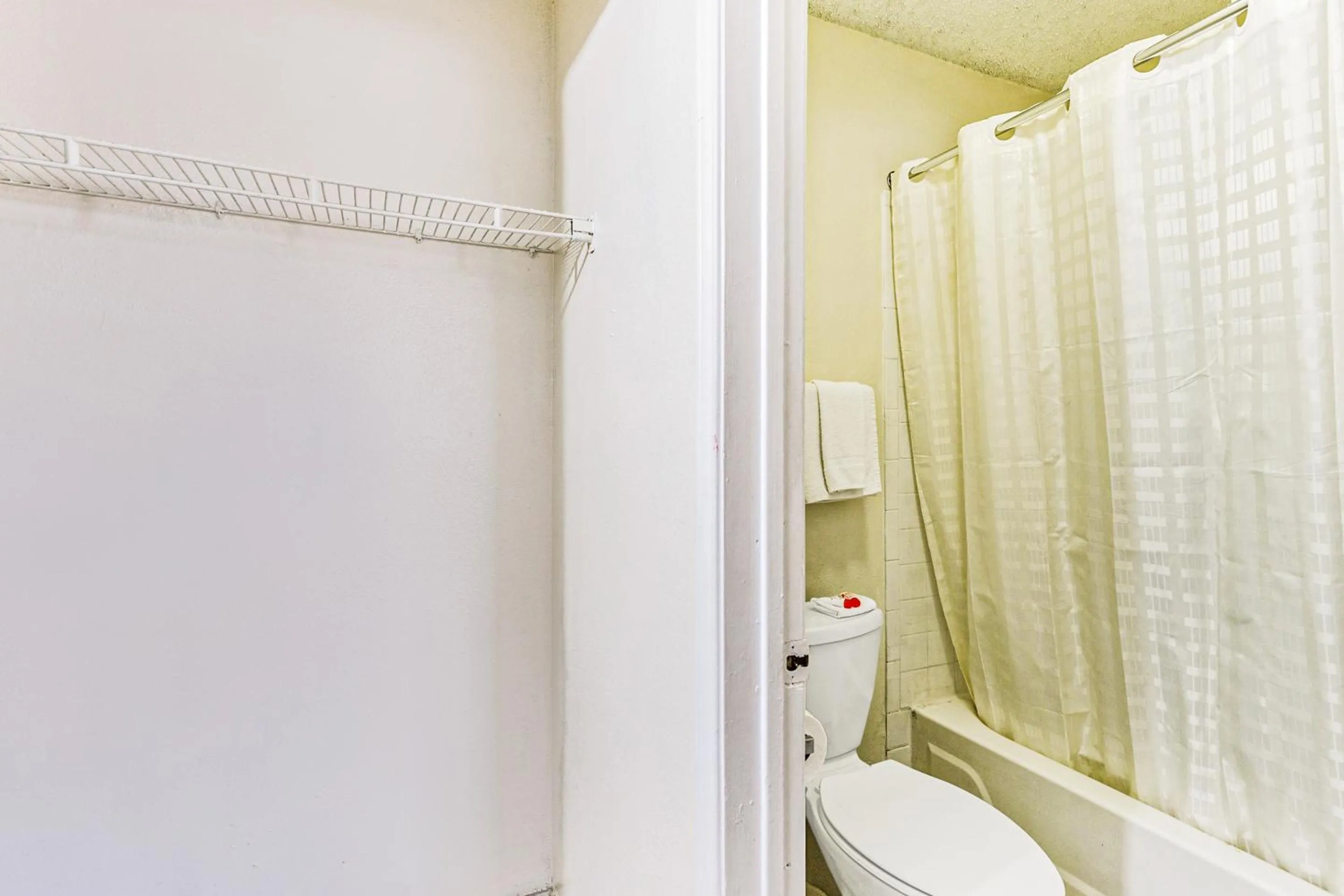 Bathroom in OYO Hotel San Antonio Lackland near Seaworld