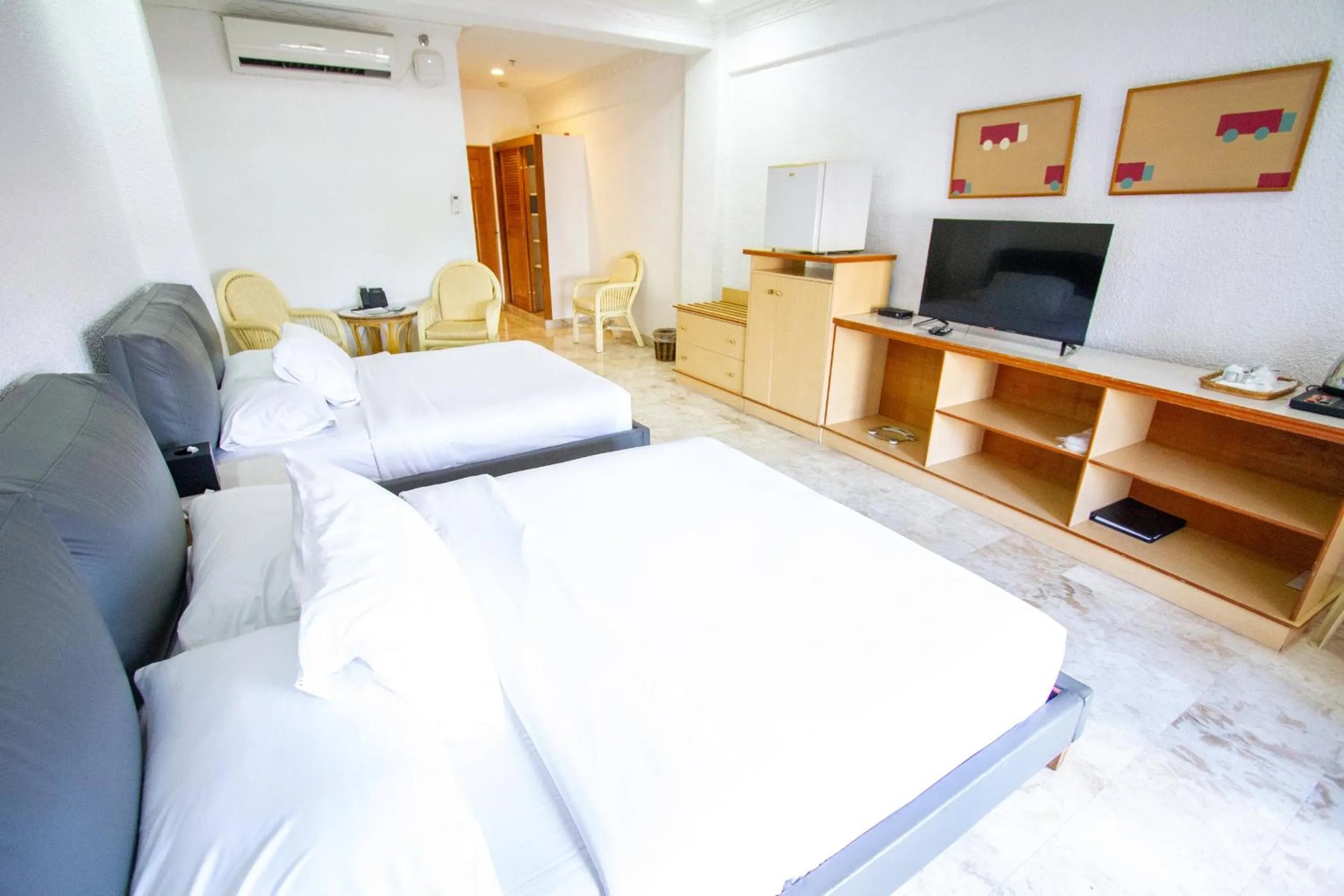 Bed in Clarkton Hotel Apartment