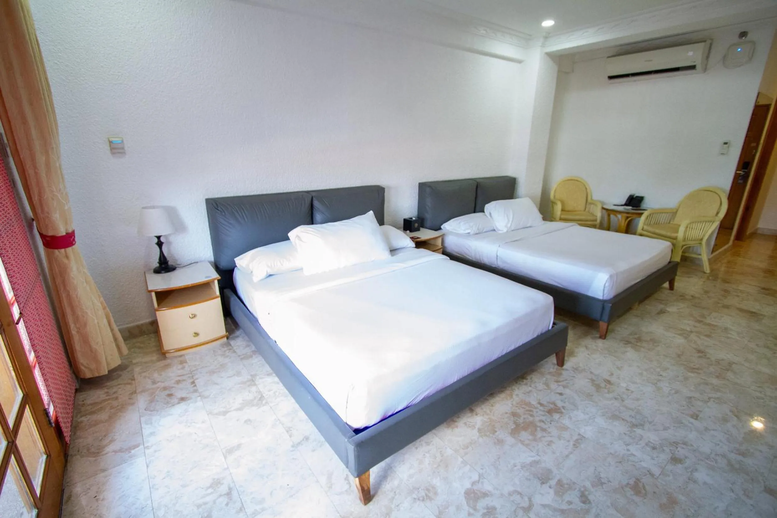 Bed in Clarkton Hotel Apartment