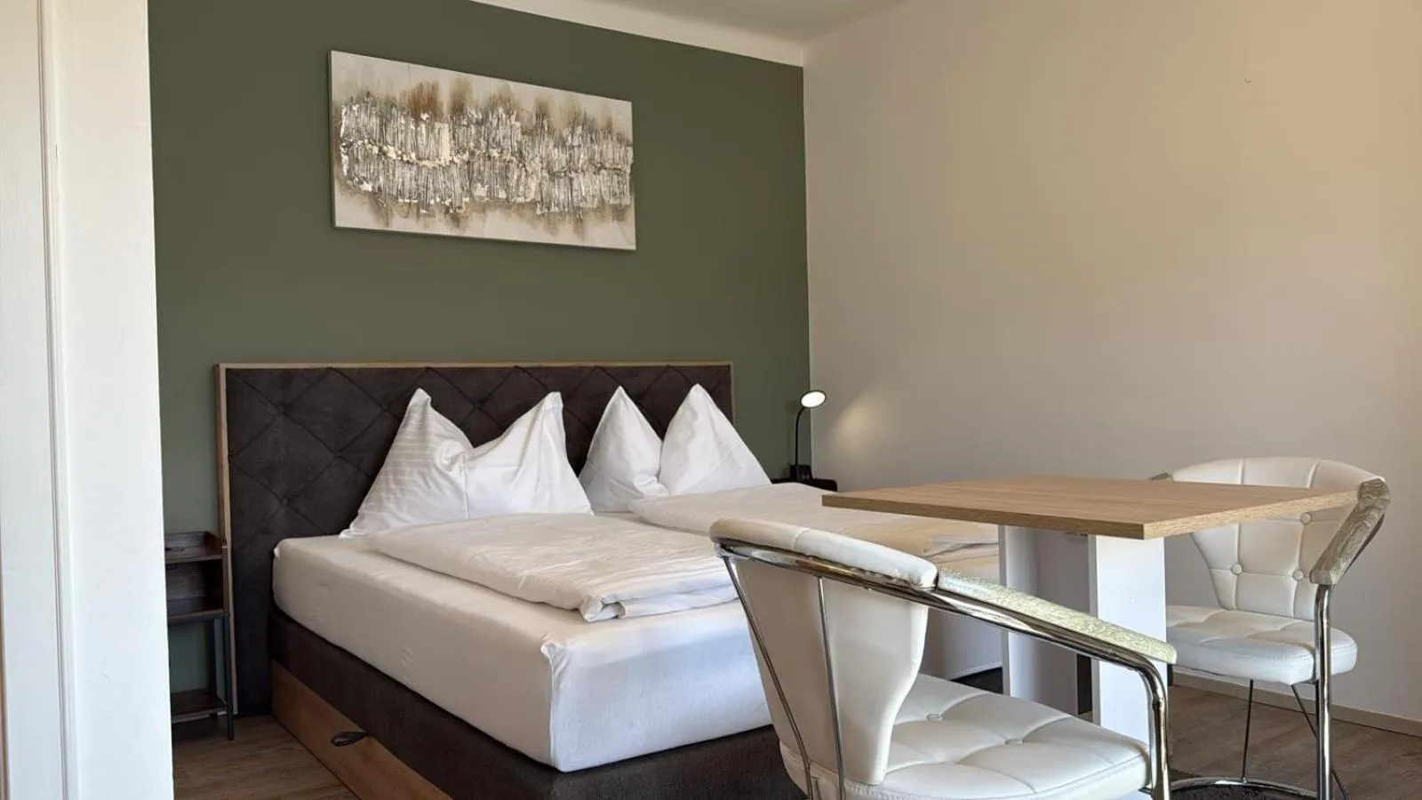 Photo of the whole room, Bed in Hotel Seerose Wolfgangsee