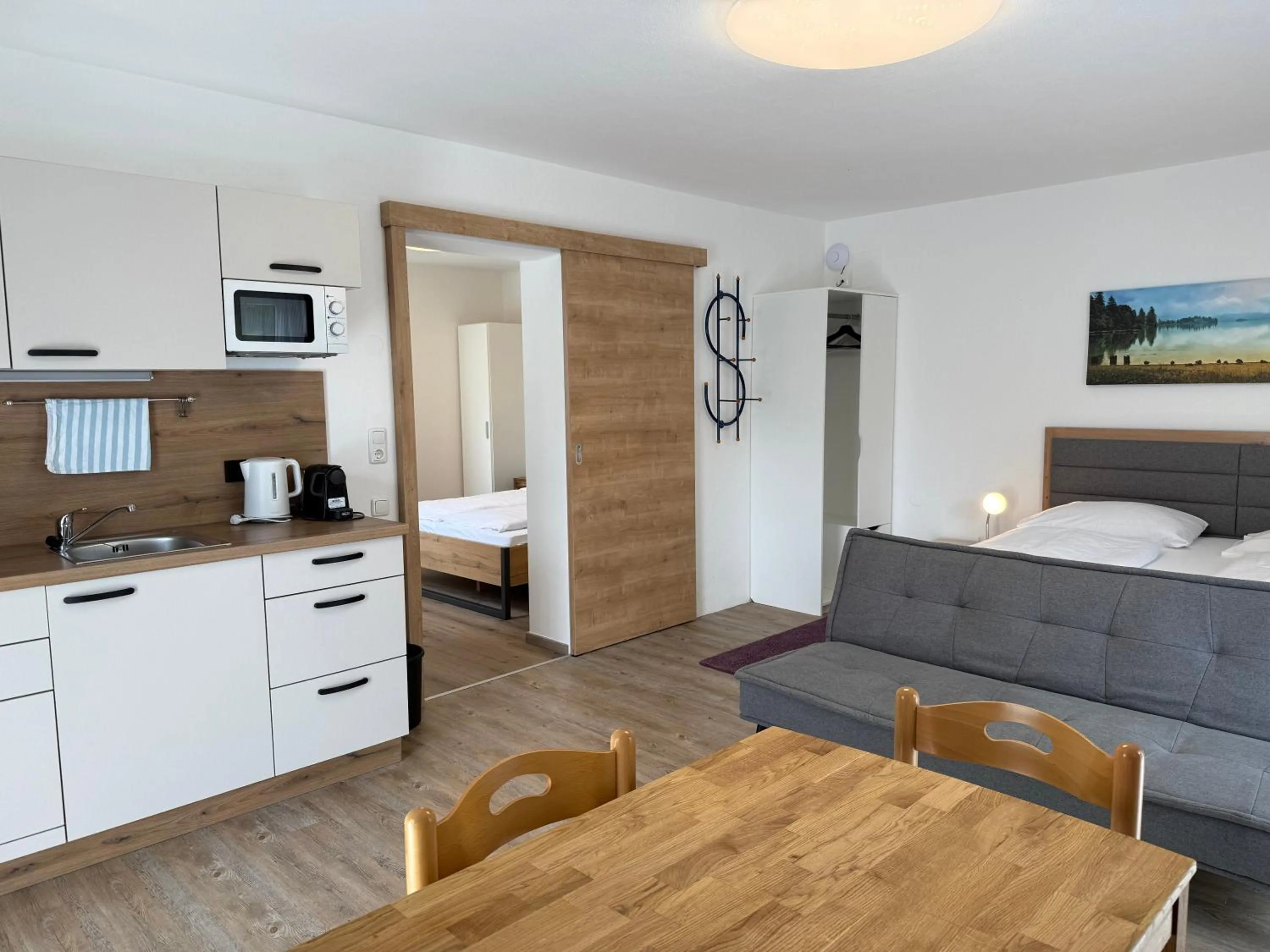 Photo of the whole room, Bed in Hotel Seerose Wolfgangsee