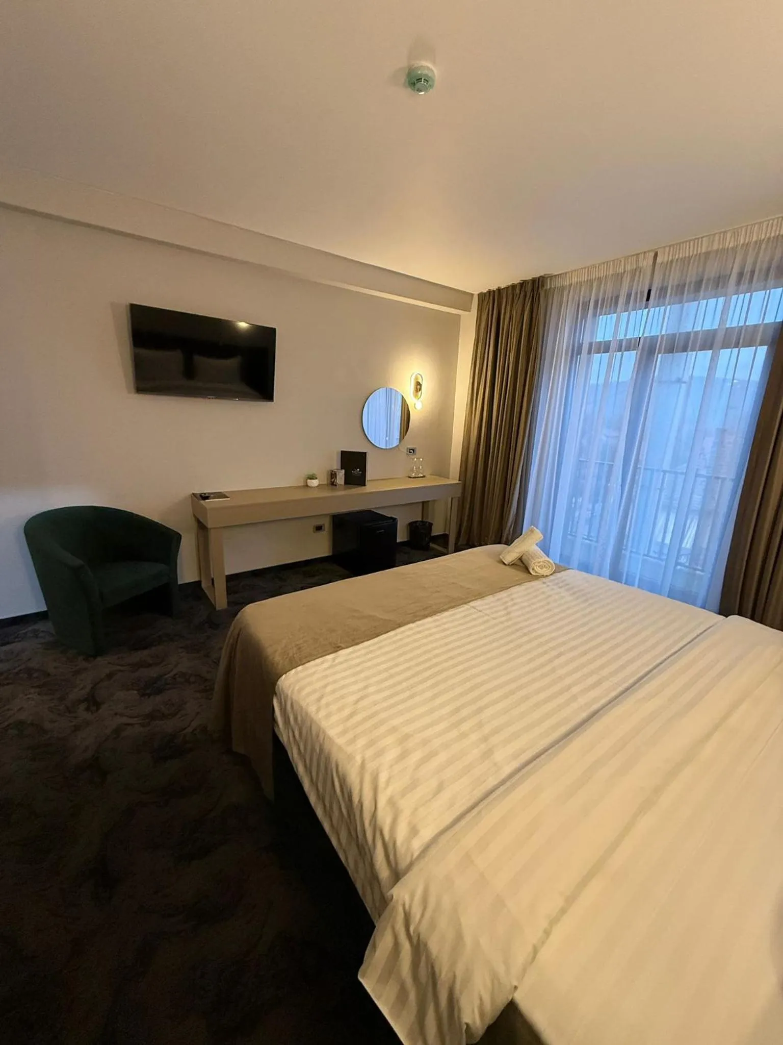 Bed in Black Tulip Hotel