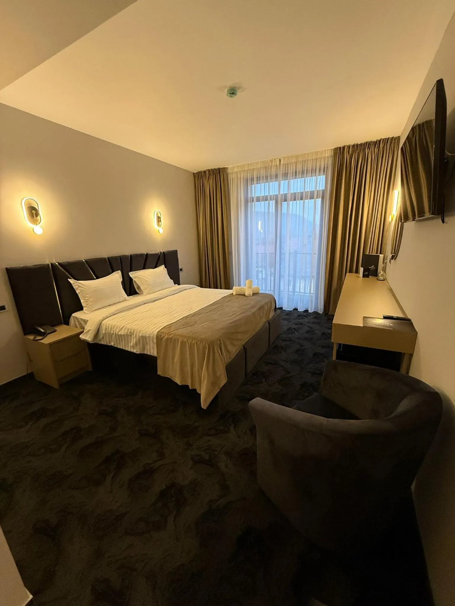 Bed in Black Tulip Hotel