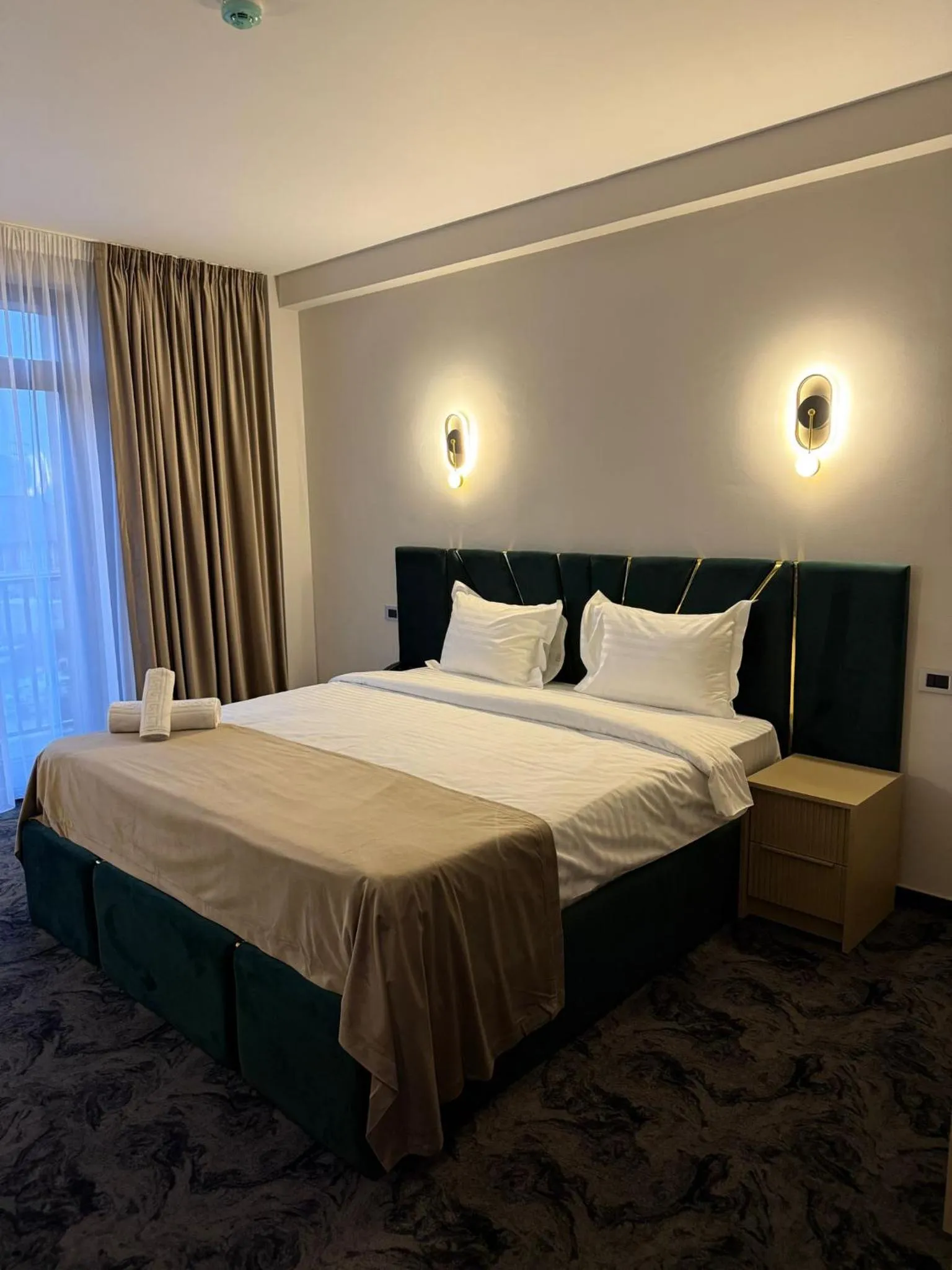 Bed in Black Tulip Hotel