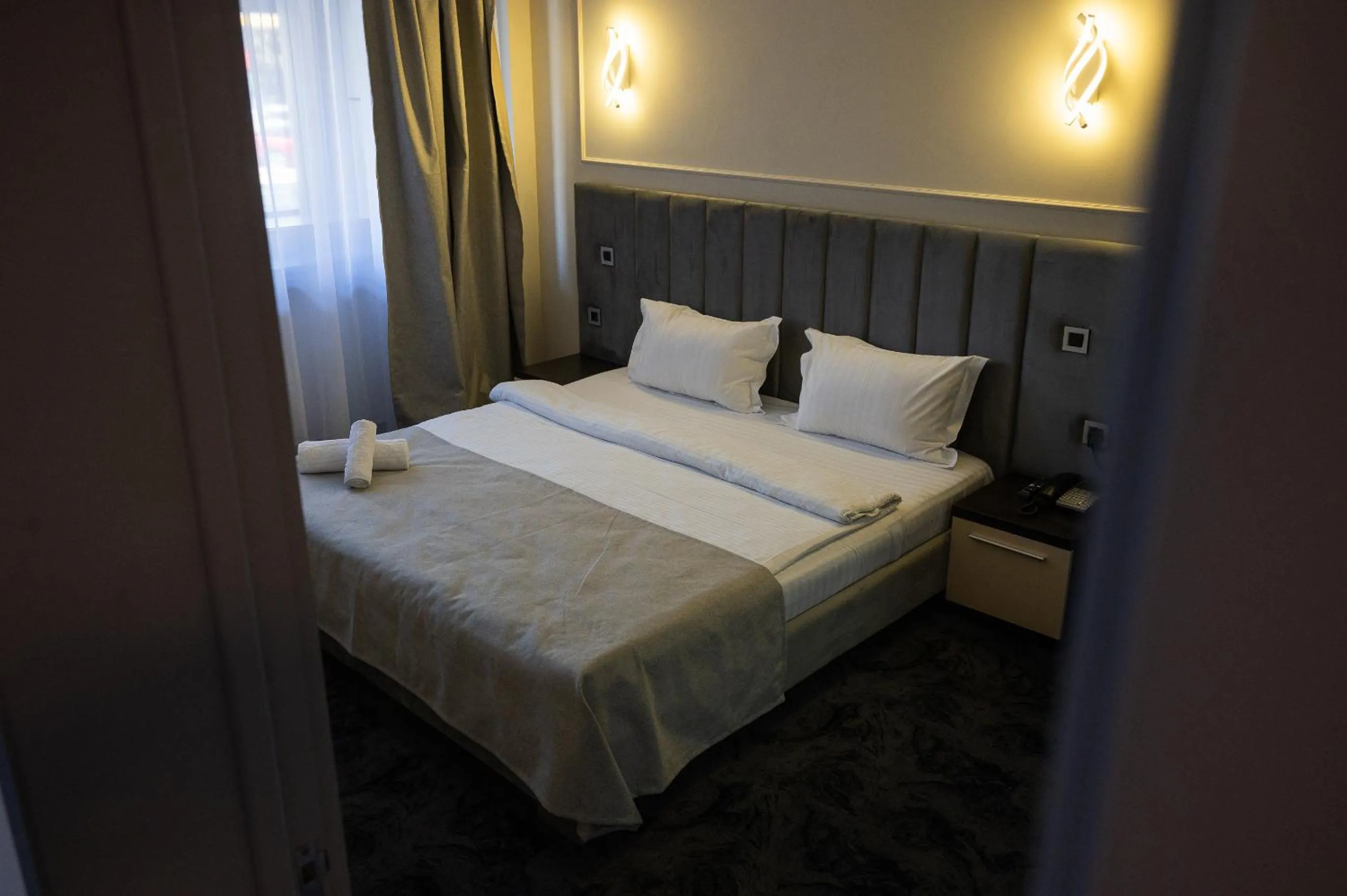 Bed in Black Tulip Hotel