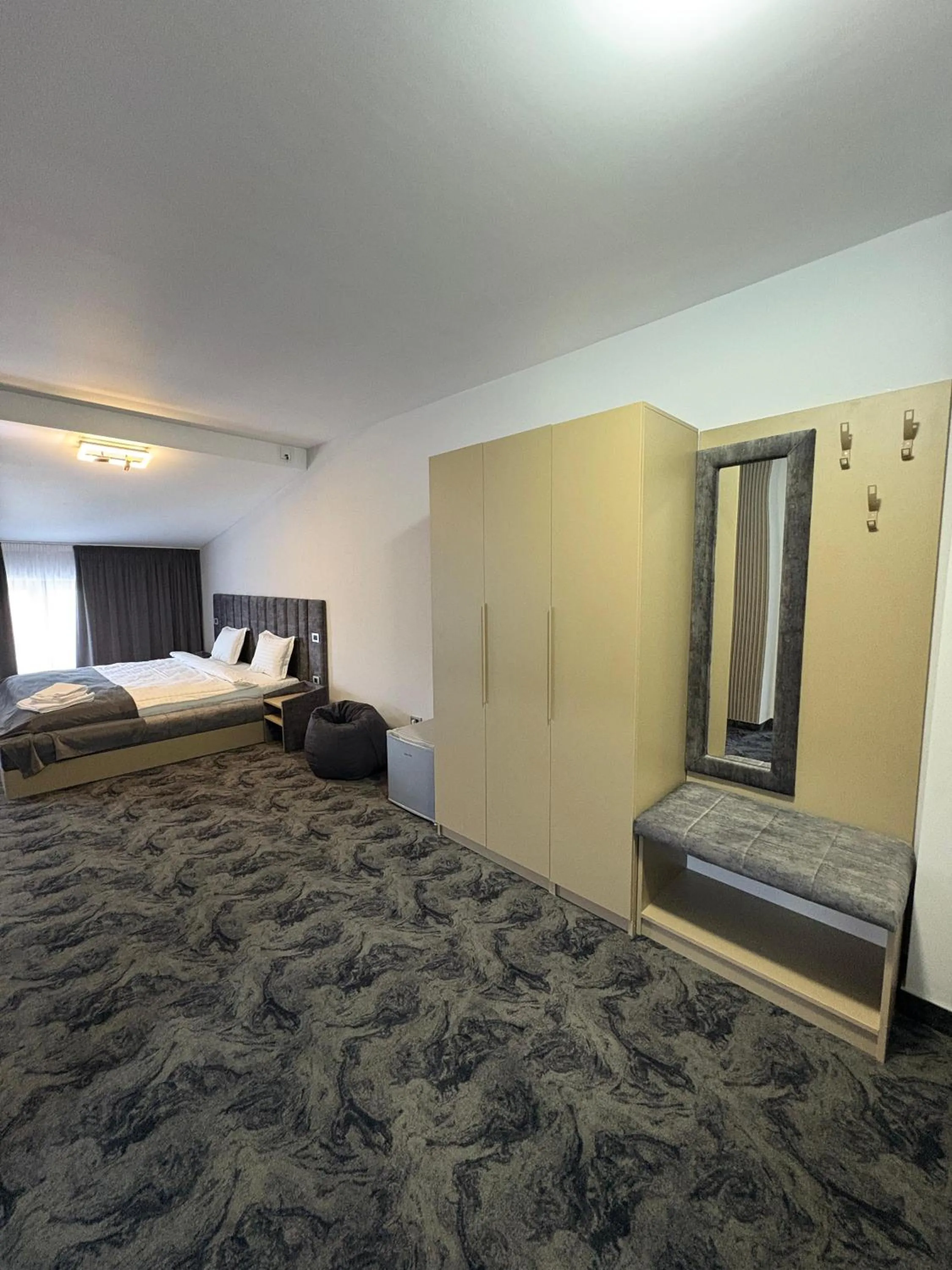 Bed in Black Tulip Hotel