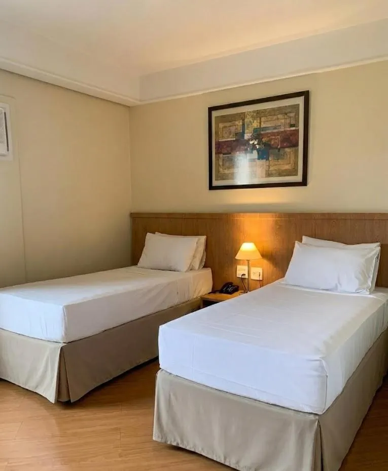 Bed in Bienal Suítes