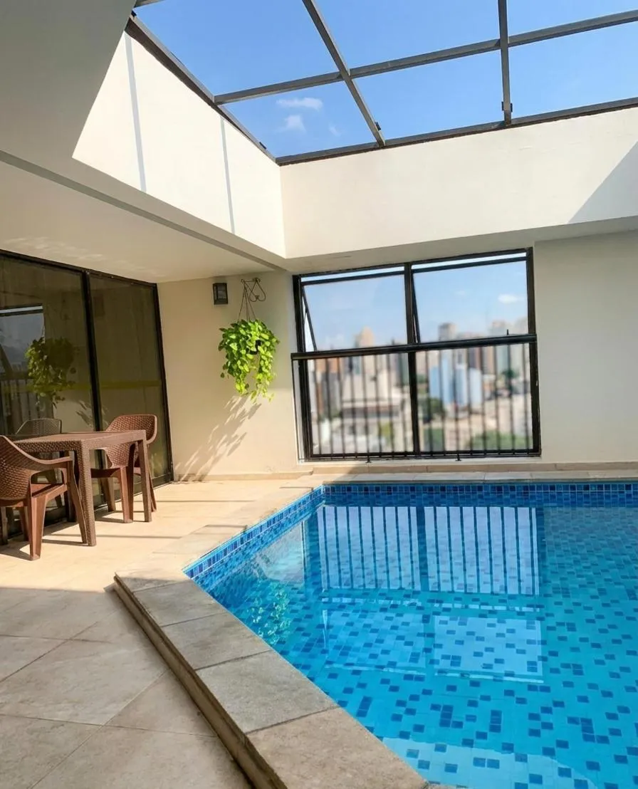 Swimming pool in Bienal Suítes