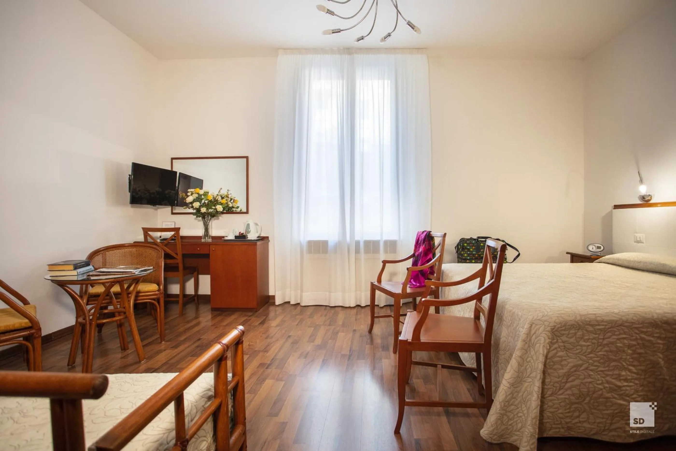 Photo of the whole room, Bed in Hotel Blumen Collection by GSA Hotels