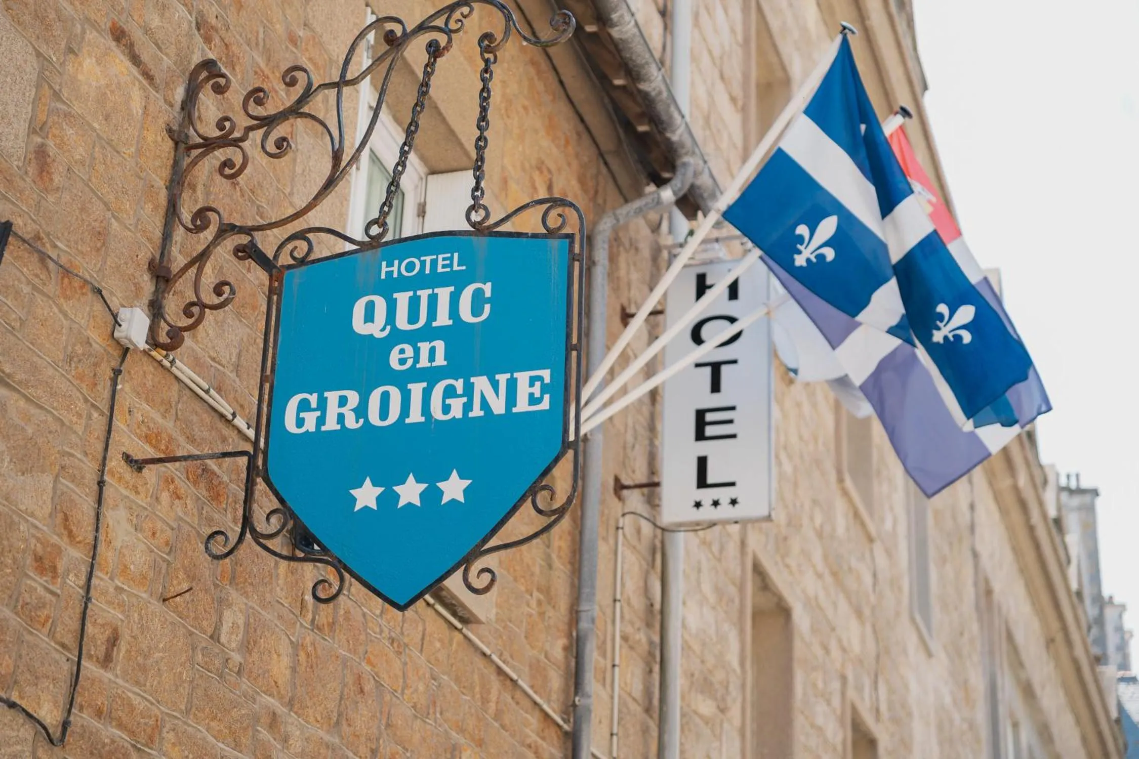 Property logo or sign in Hôtel Quic en Groigne
