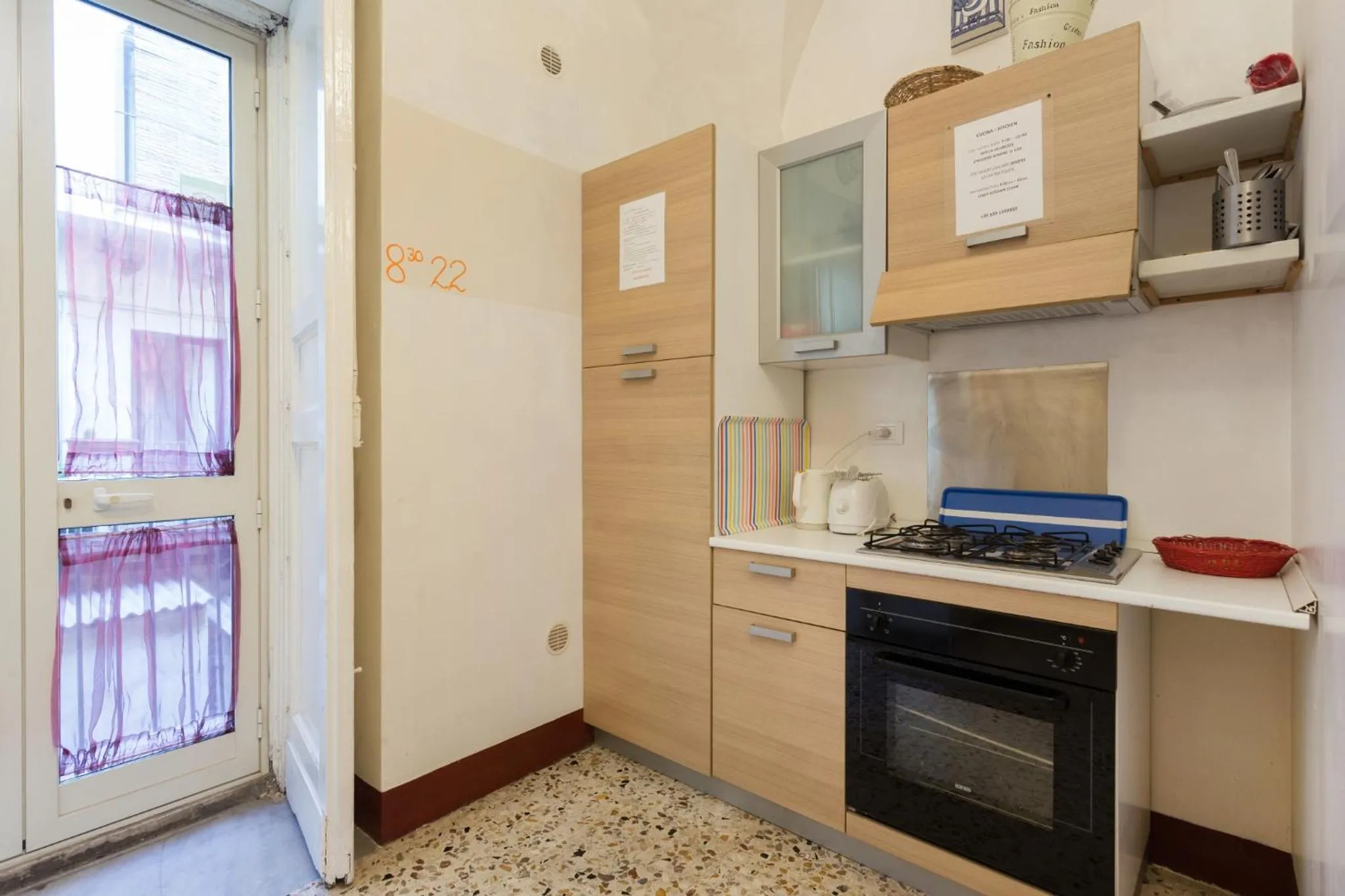 Kitchen or kitchenette in Da Gianni e Lucia Rooms with bathroom in the city center