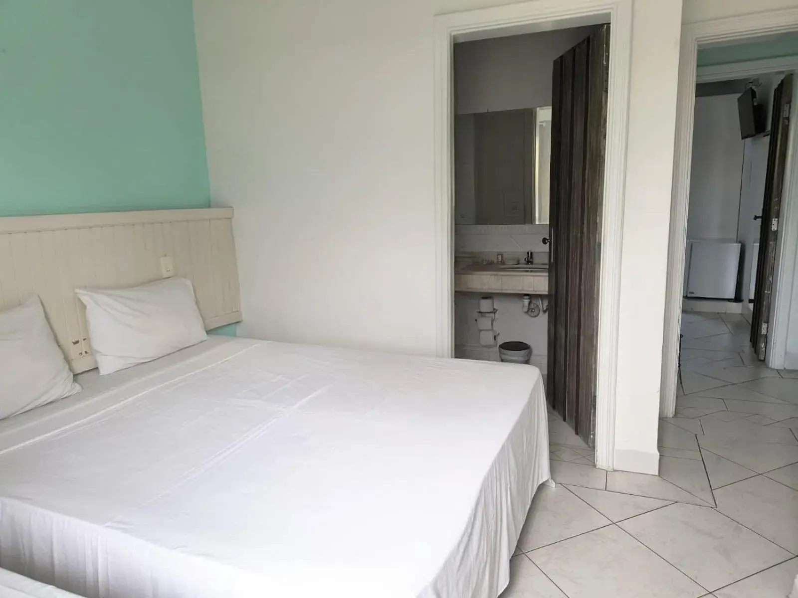 Triple Room in Jequitiba Hotel Frente ao Mar Triple Room in Jequitiba Hotel Frente ao Mar