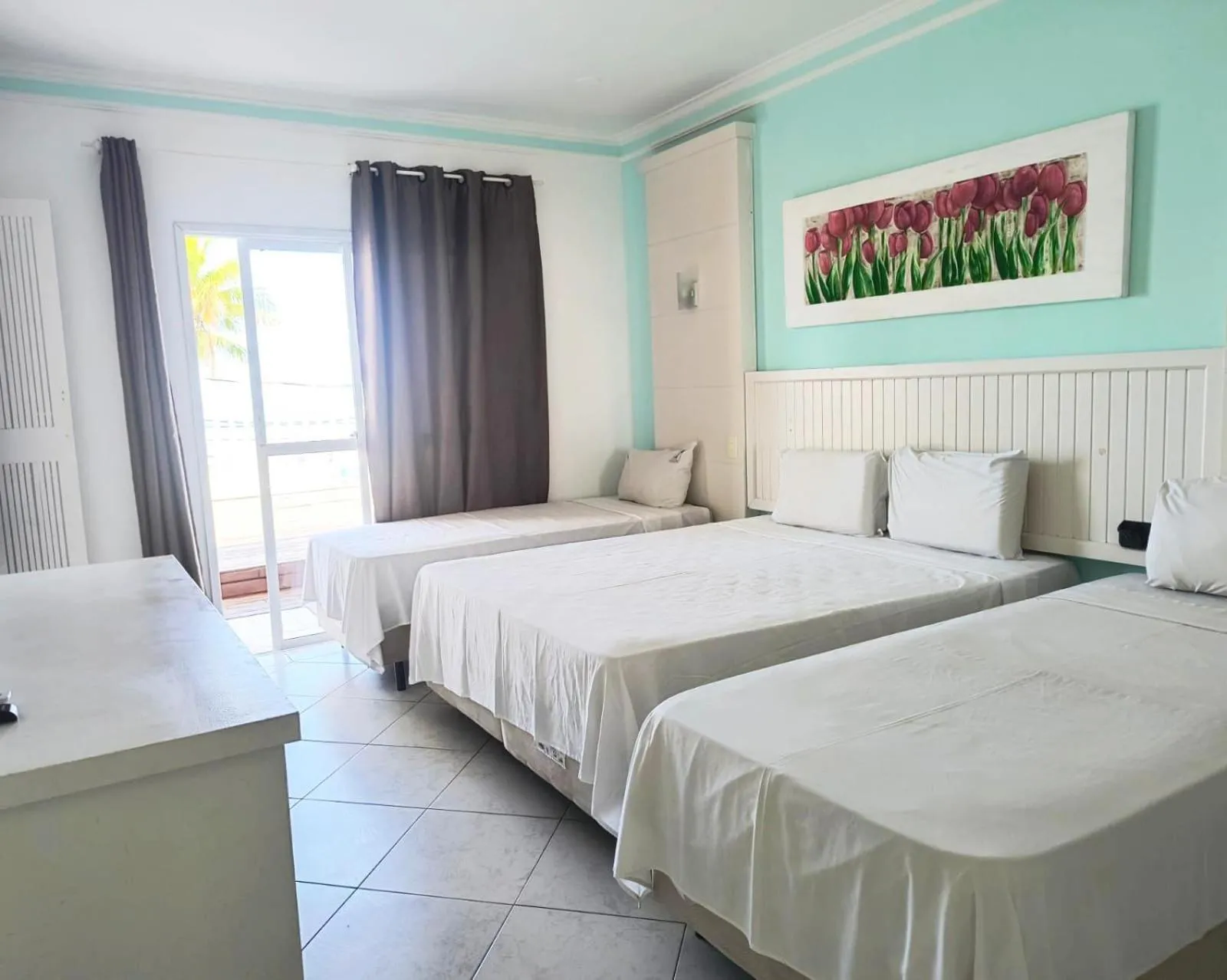 Luxury Quadruple Room in Jequitiba Hotel Frente ao Mar