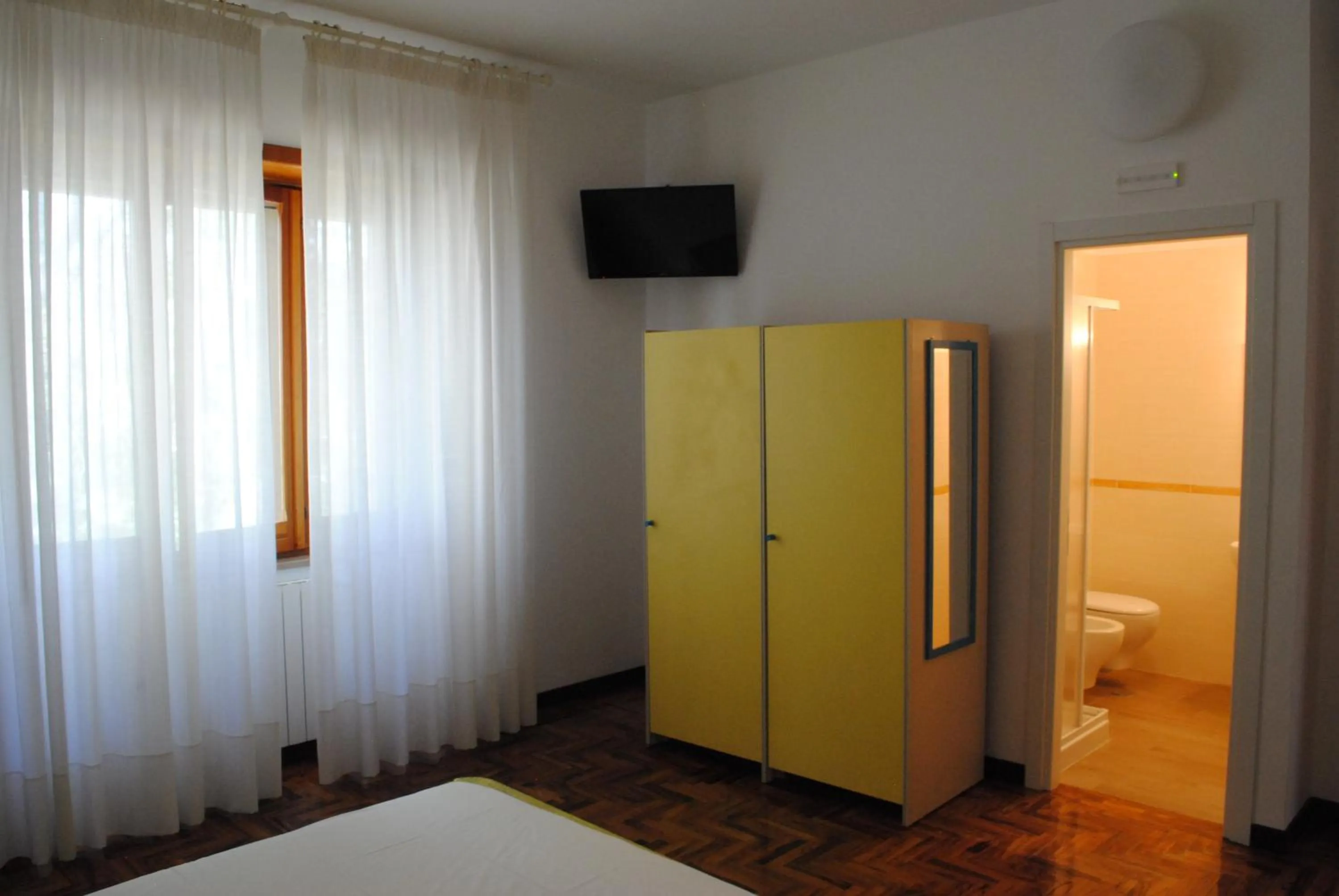 Photo of the whole room in Dimora Romano