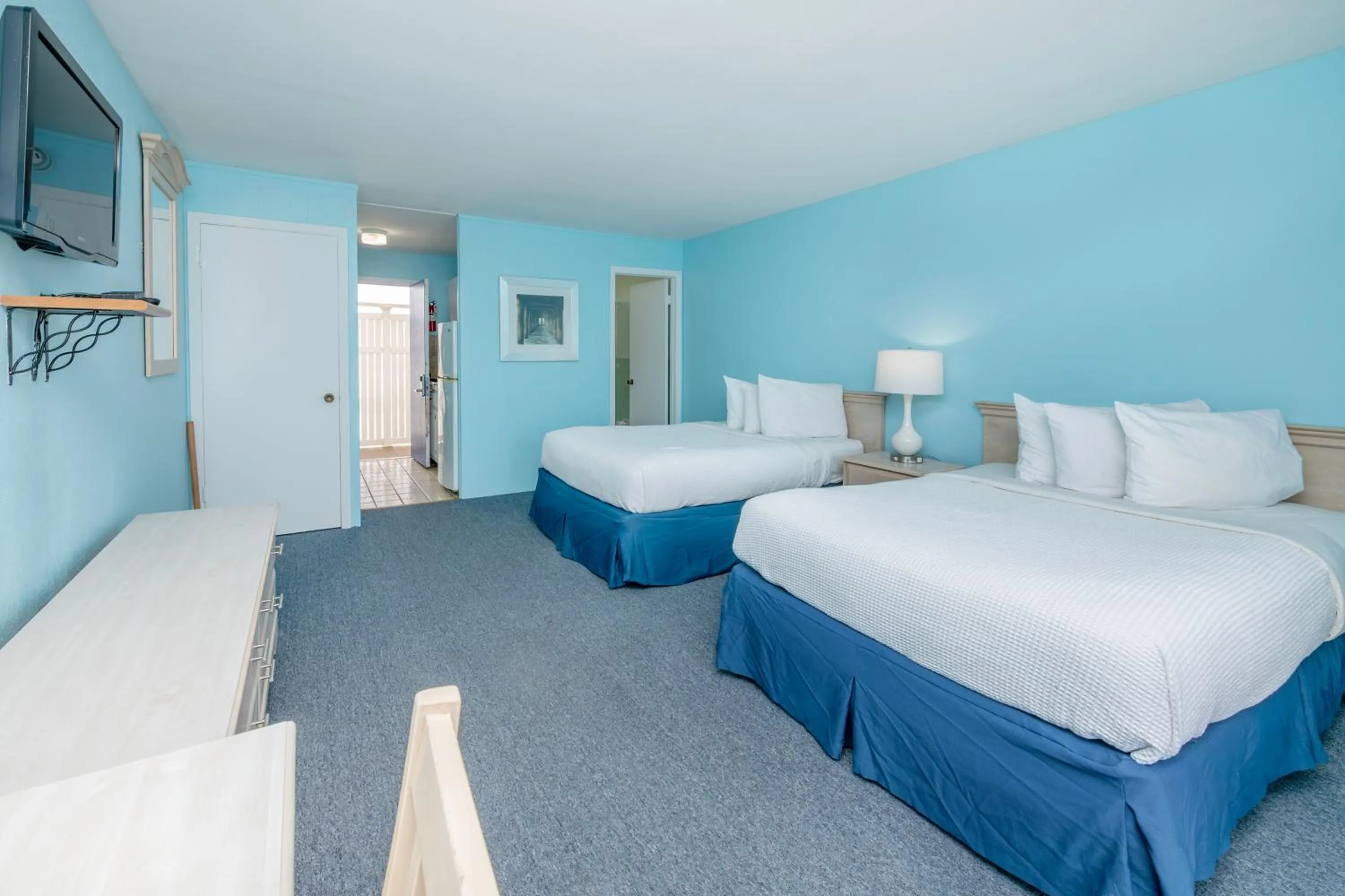 Bed in Drifting Sands Oceanfront Hotel