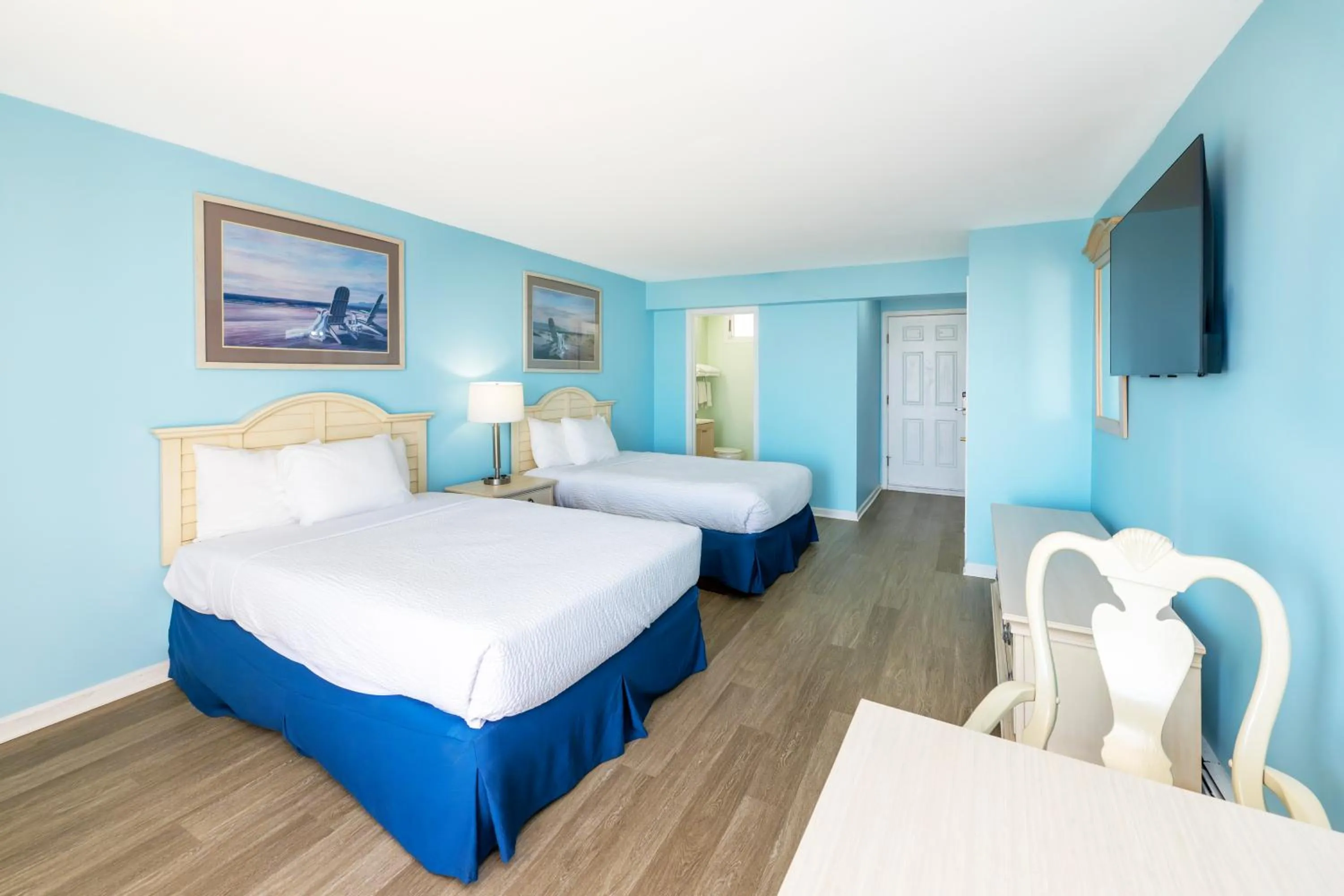 Bed in Drifting Sands Oceanfront Hotel