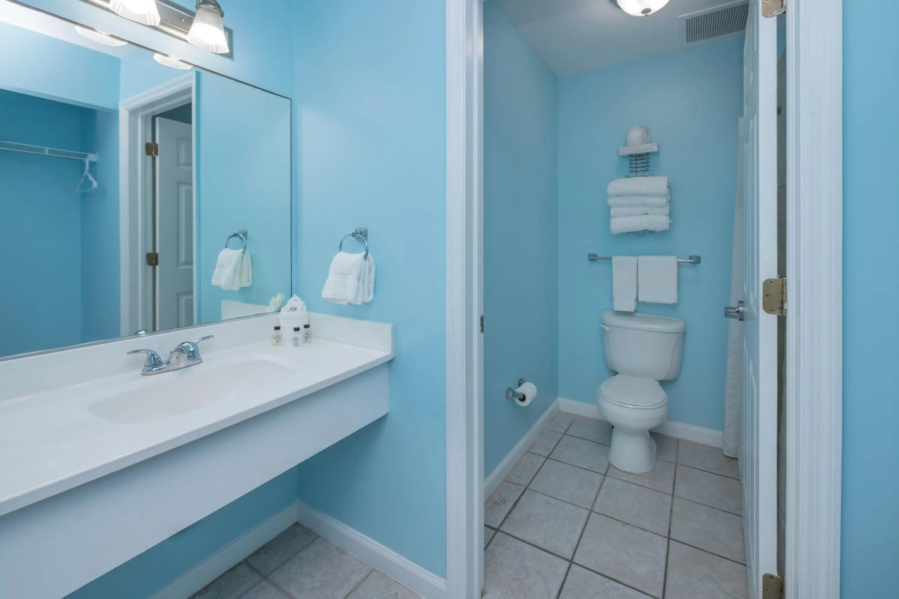 Toilet in Drifting Sands Oceanfront Hotel