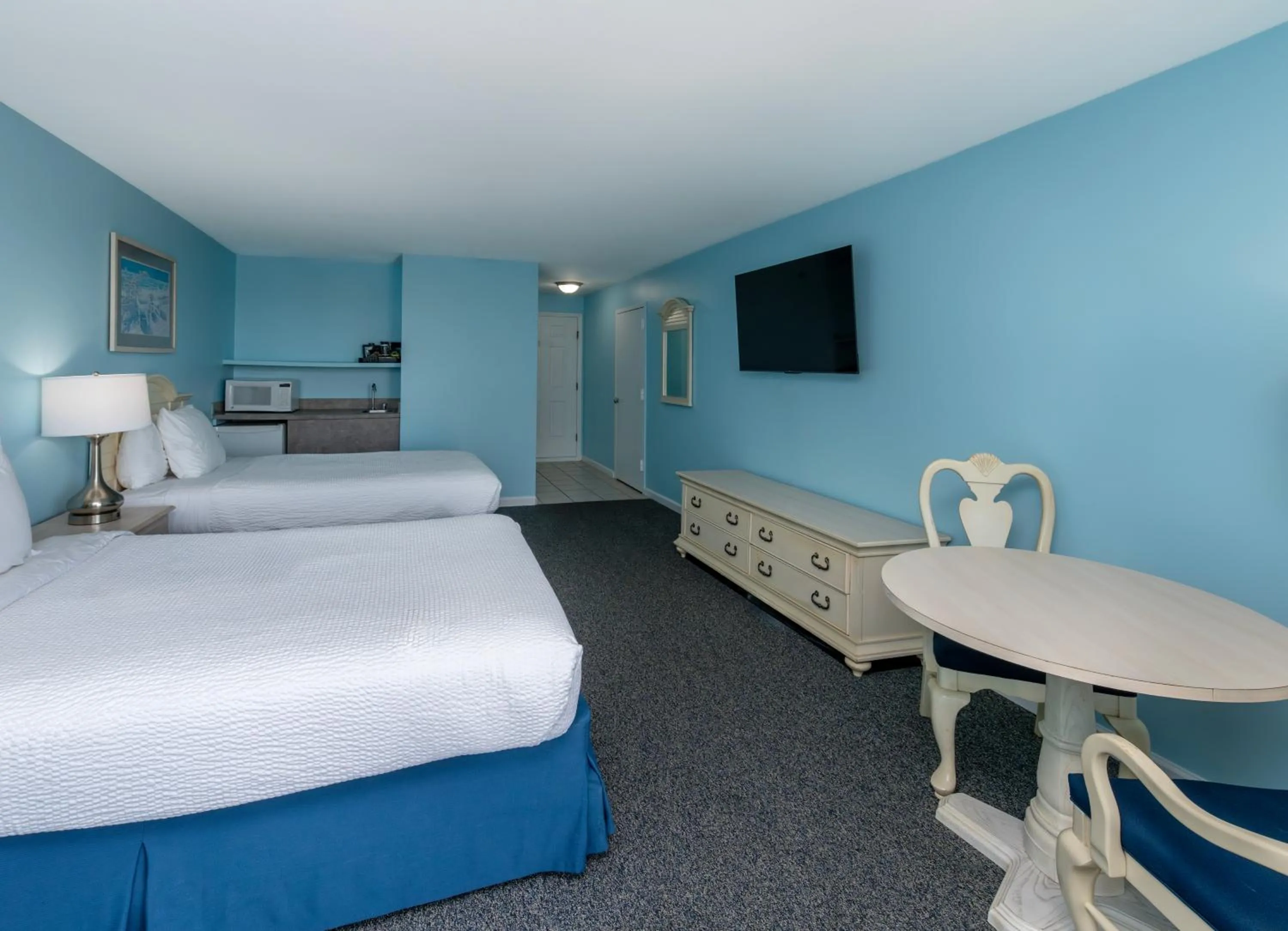 Bed in Drifting Sands Oceanfront Hotel