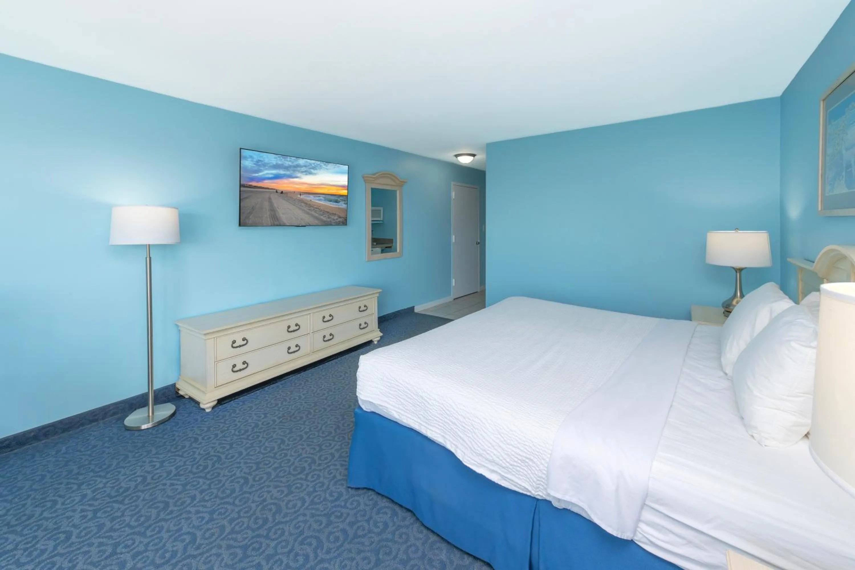 Bed in Drifting Sands Oceanfront Hotel