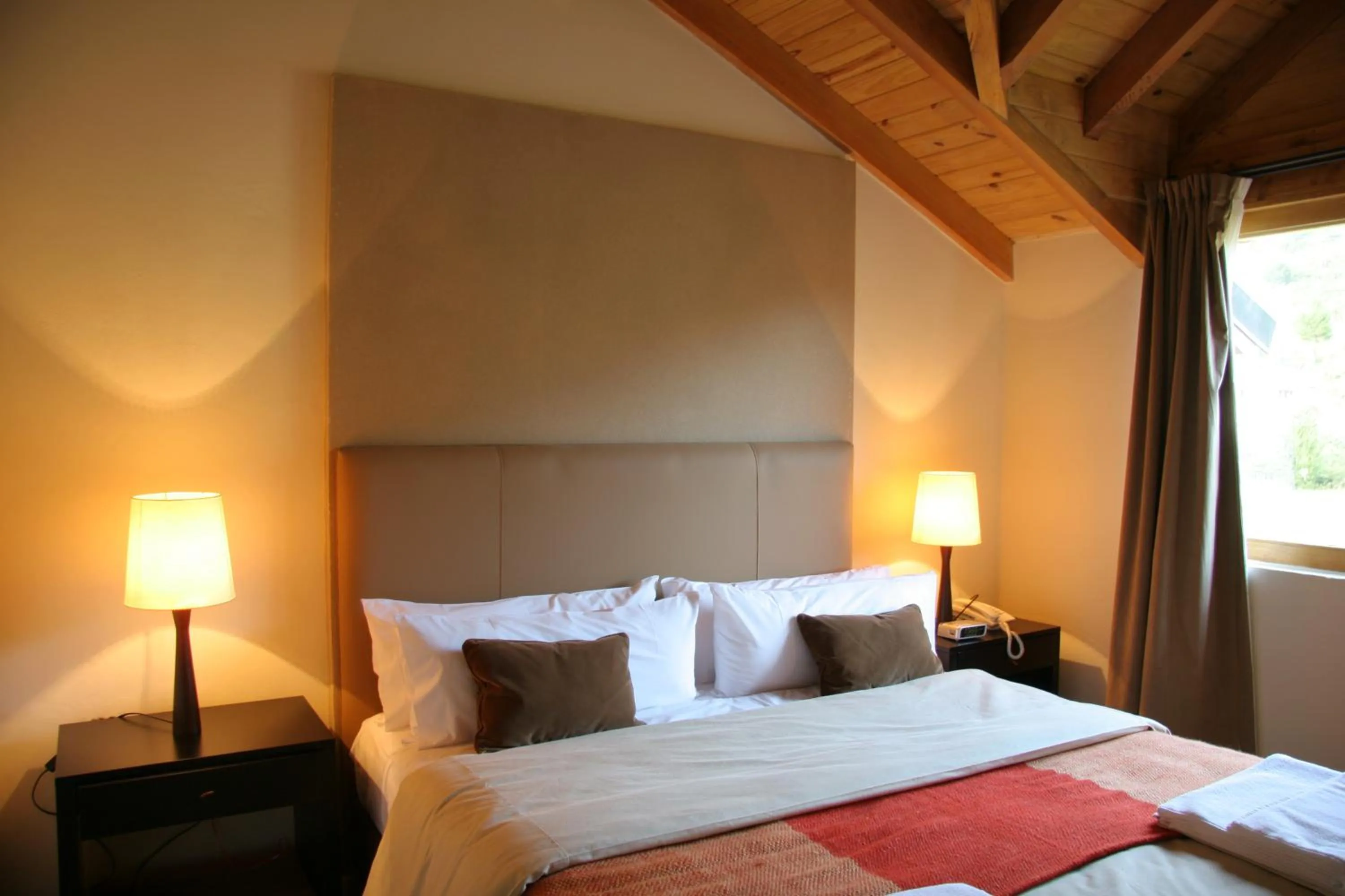 Bed in Galileo Boutique Hotel