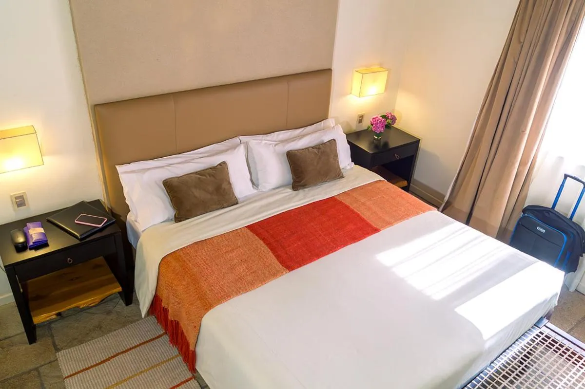 Bed in Galileo Boutique Hotel
