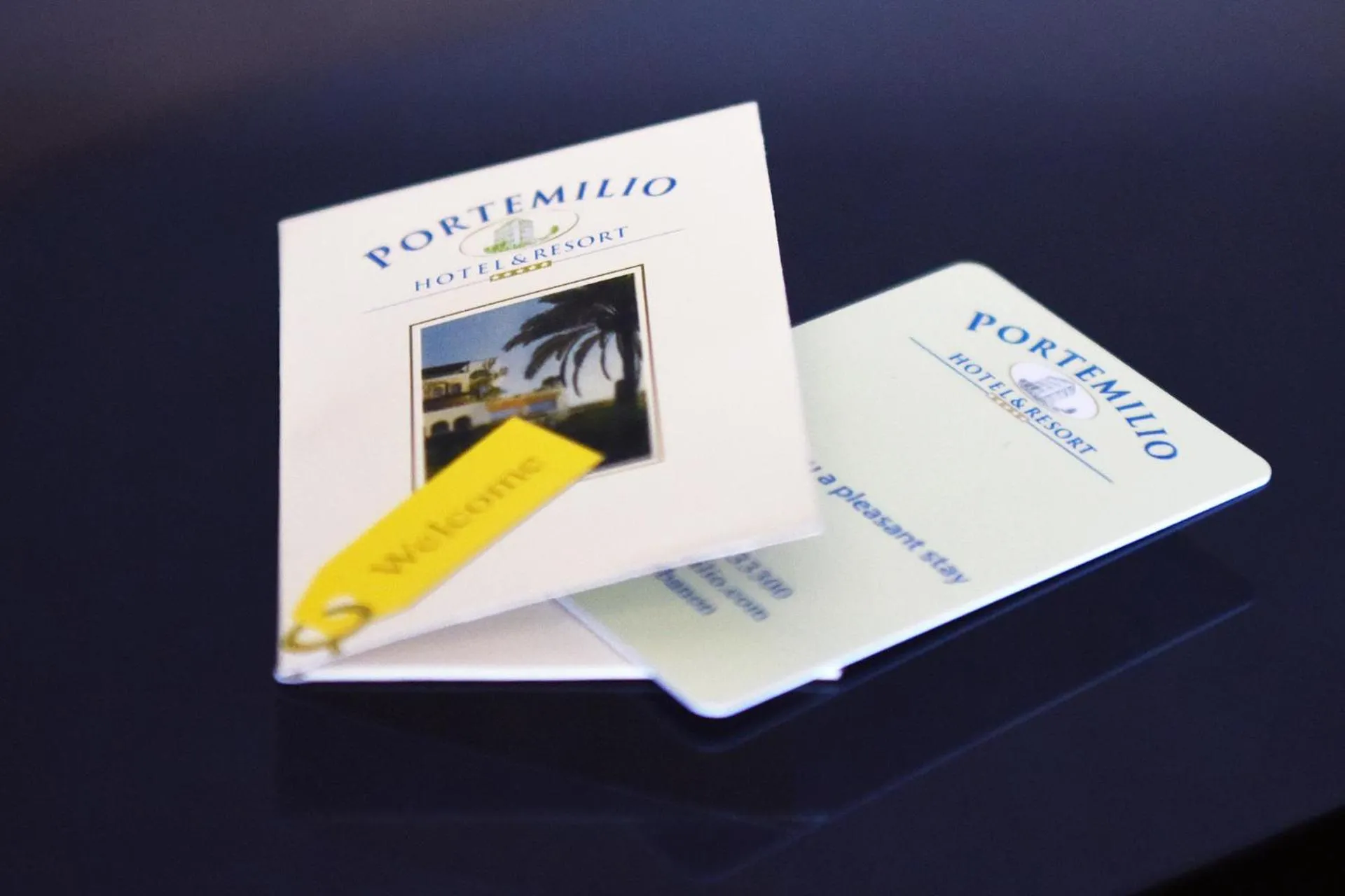 Property logo or sign in Portemilio Hotel & Resort