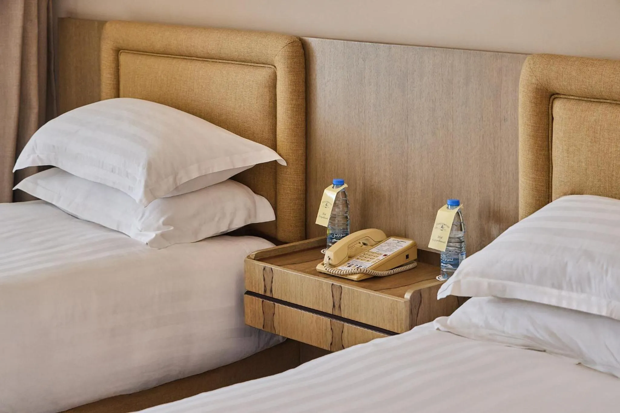 Bed in Portemilio Hotel & Resort