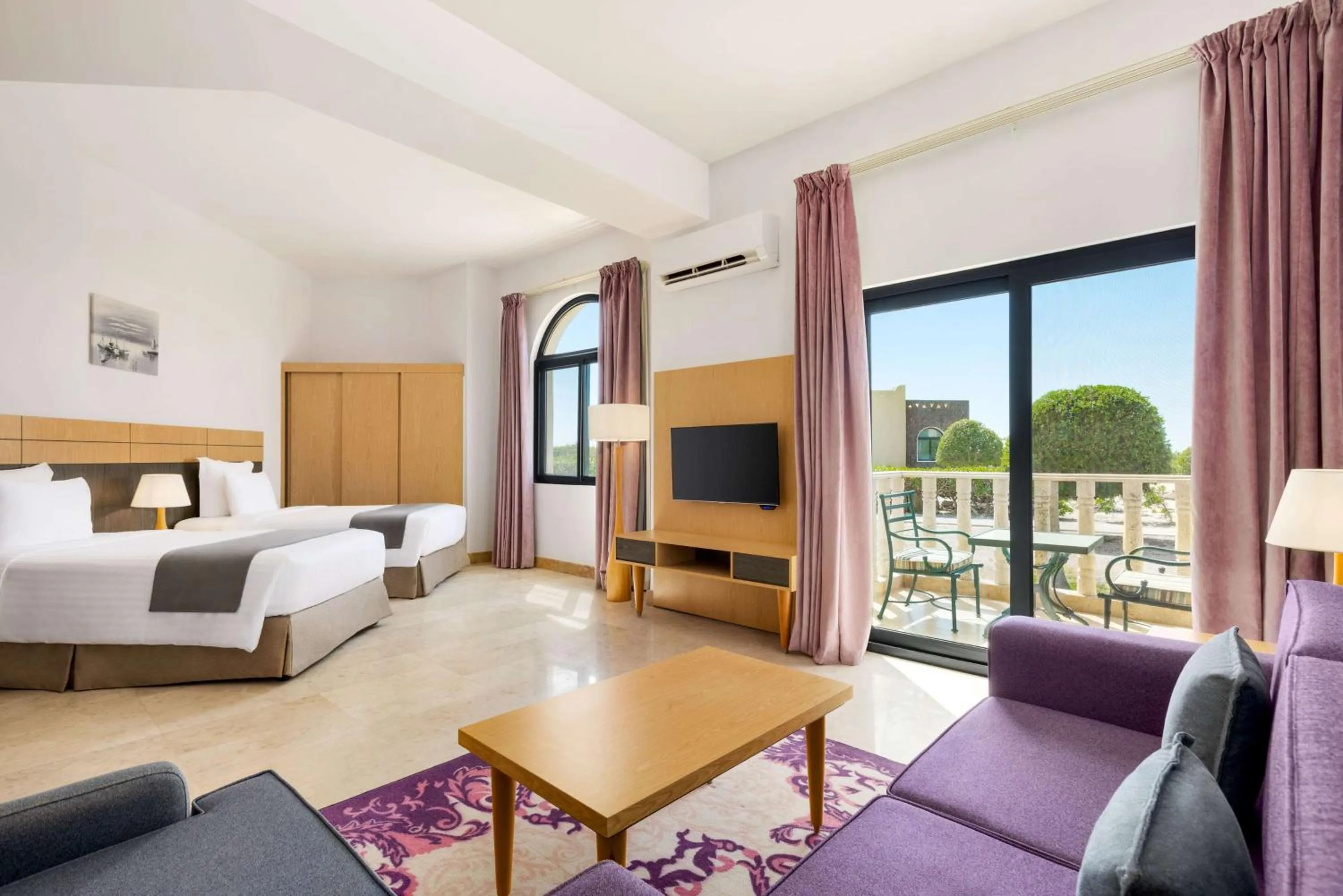 Photo of the whole room, Bed in Wyndham Garden Salalah Mirbat