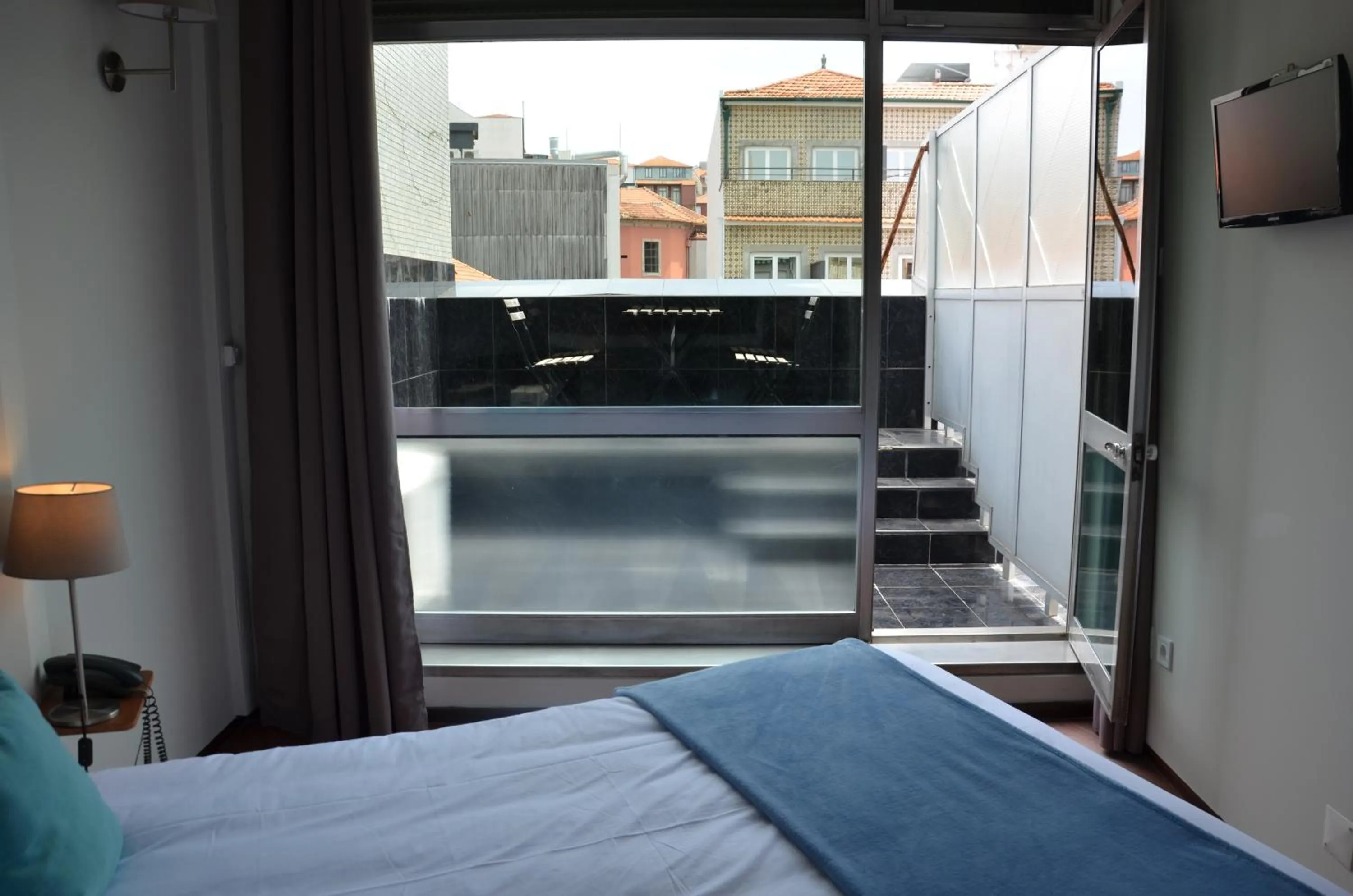 Balcony/Terrace, Bed in Hotel Girassol