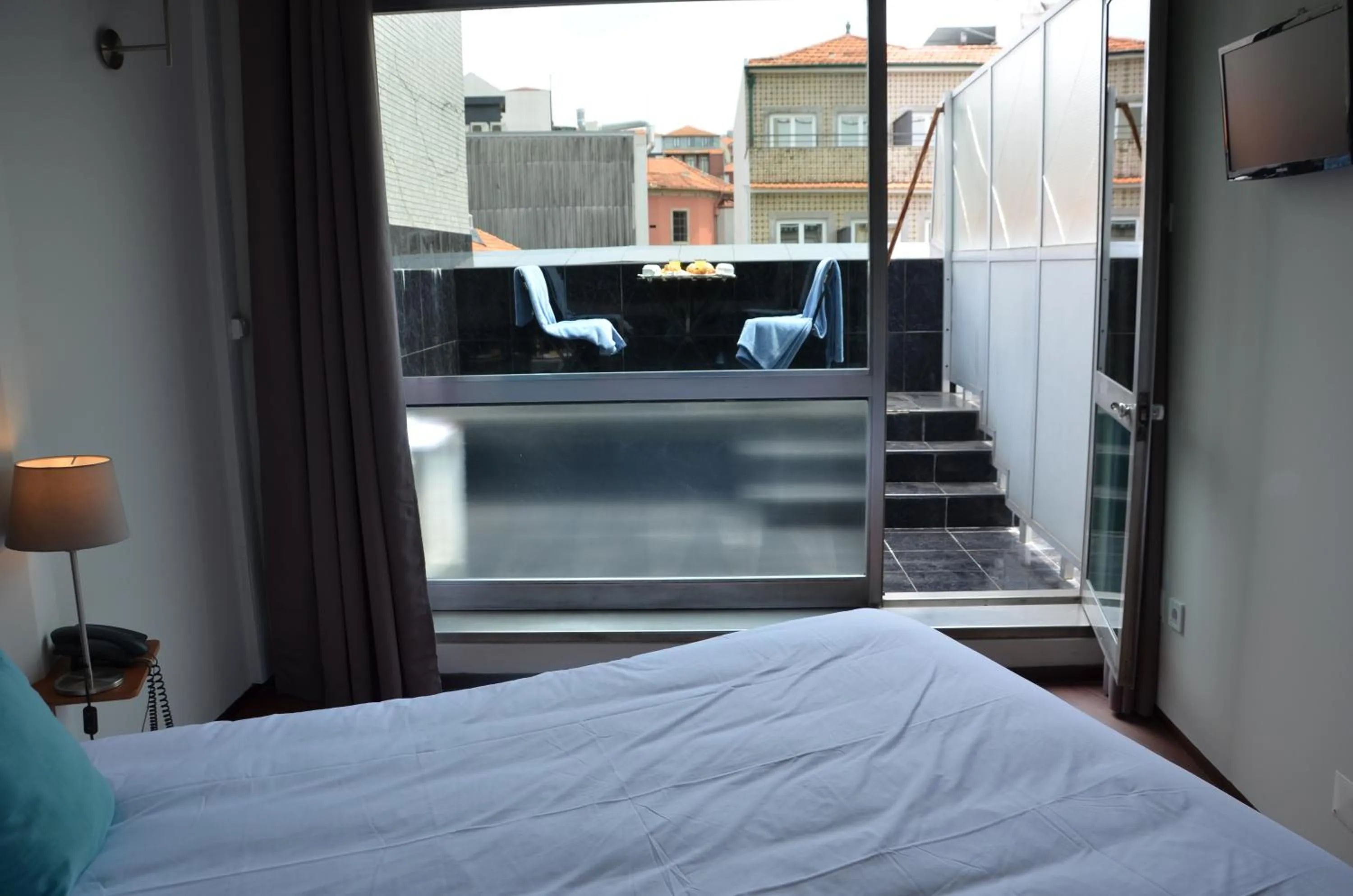 Balcony/Terrace, Bed in Hotel Girassol