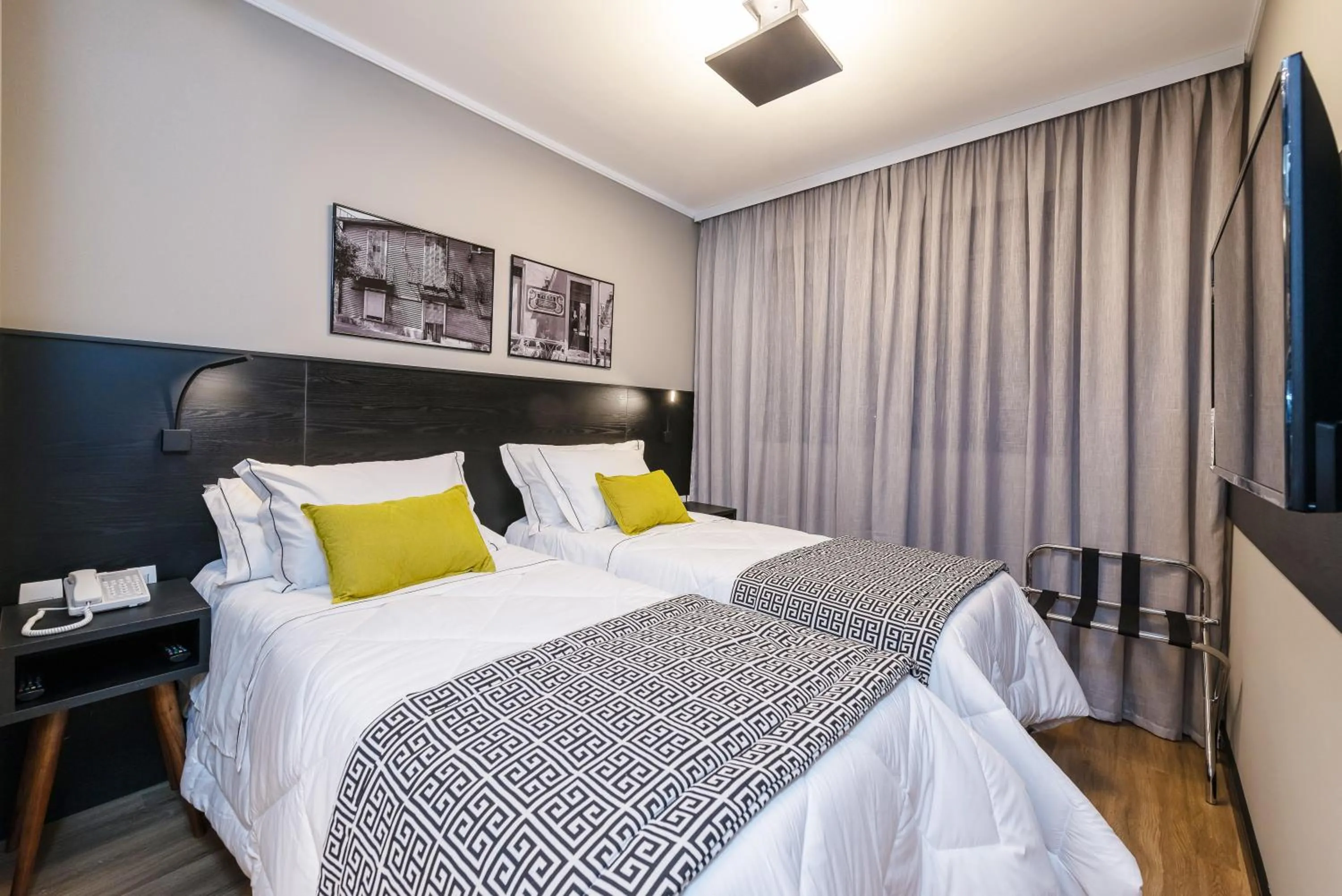 Bed in I am Design Hotel Campinas by Hotelaria Brasil