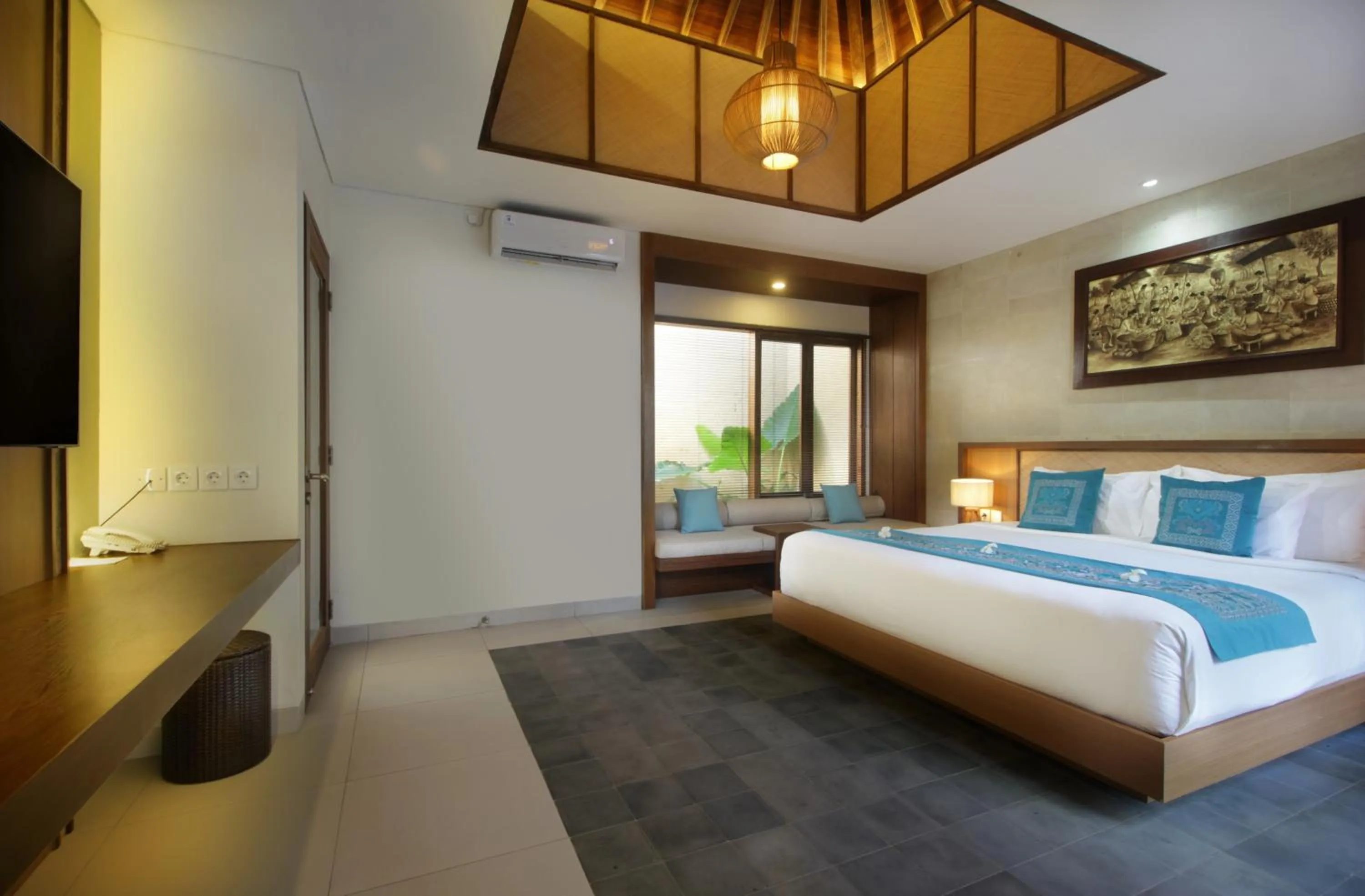 Bed in Sagara Villas and Suites Sanur by AHM