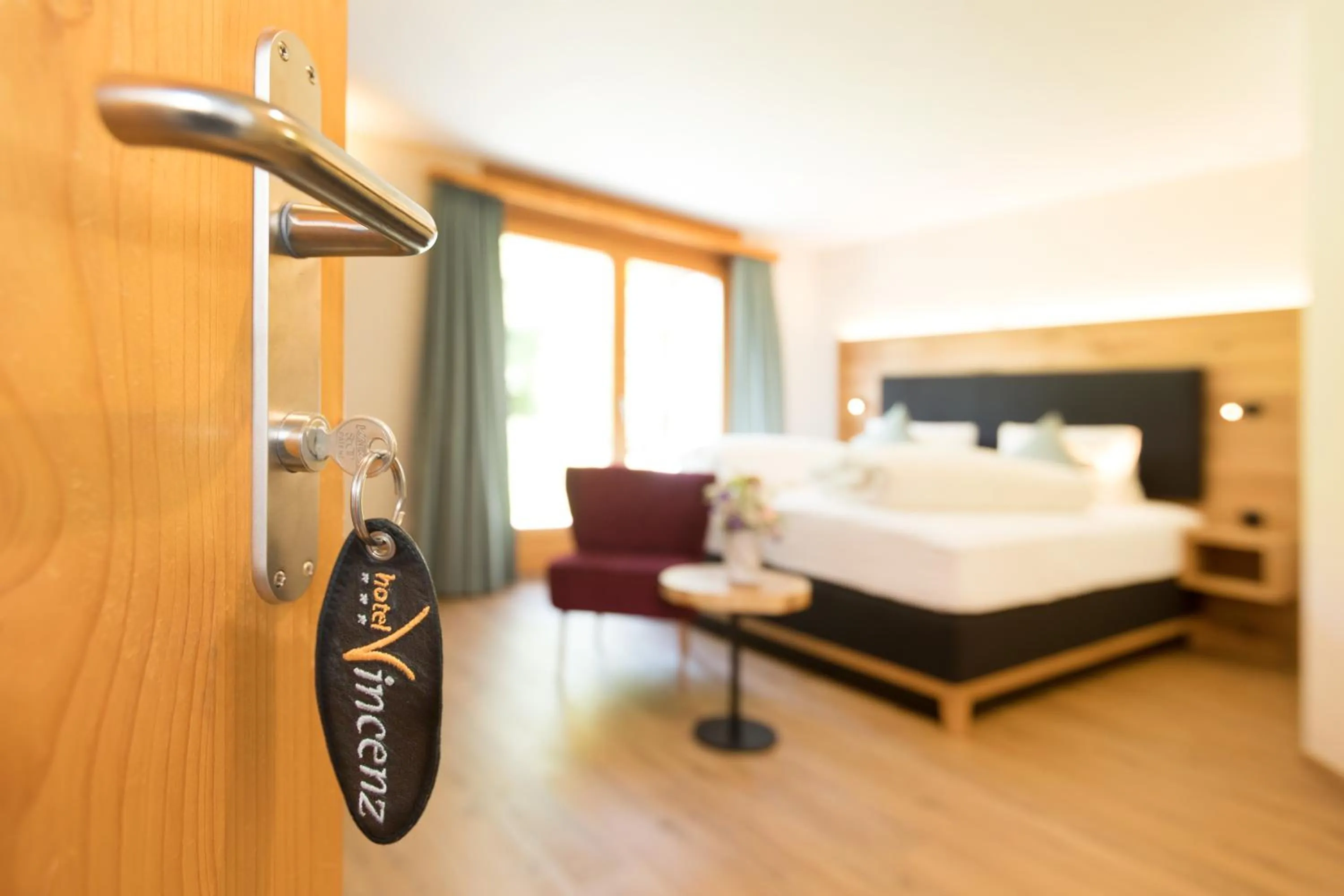 Photo of the whole room, Bed in Boutique-Hotel Vincenz