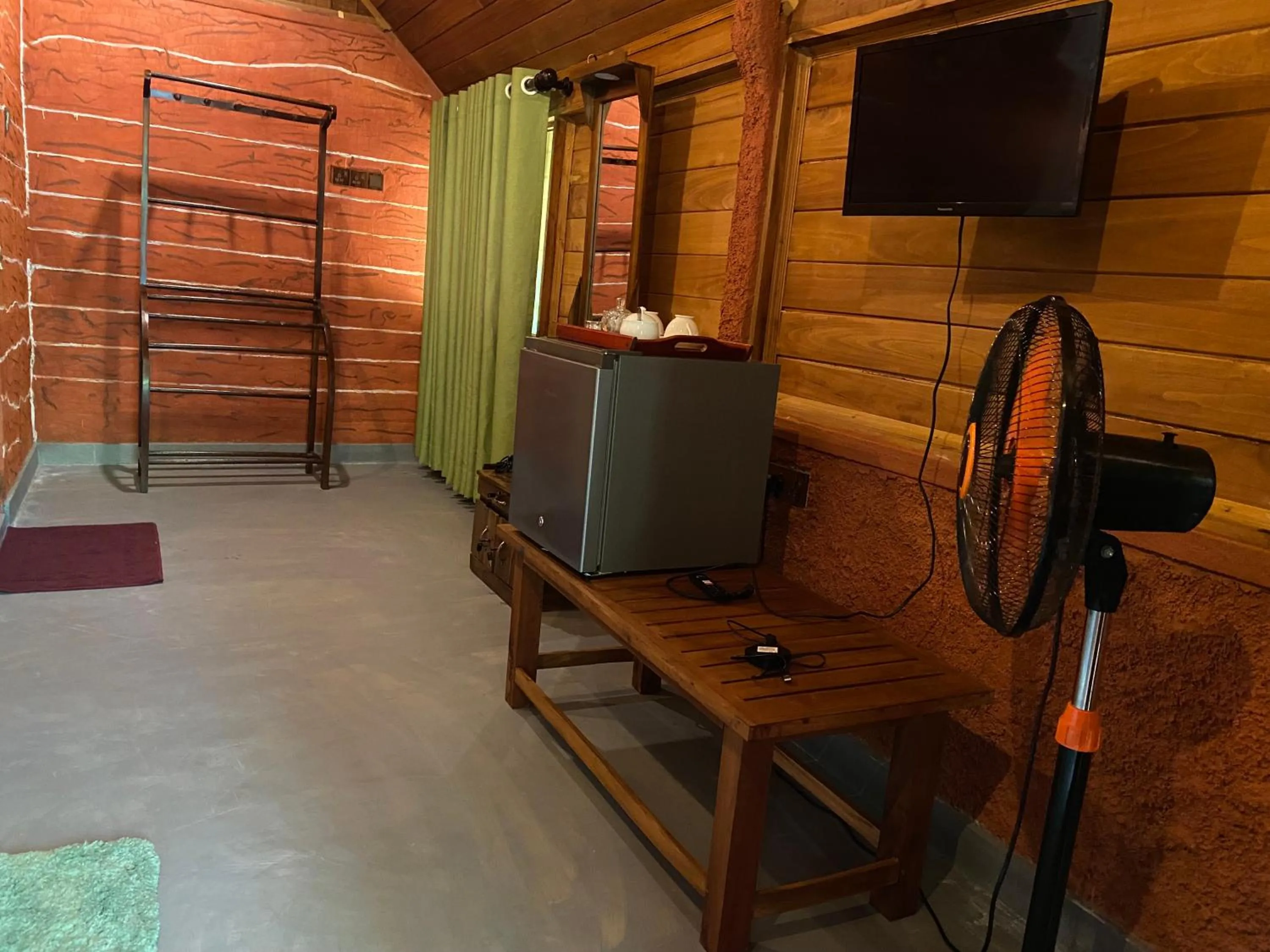 Communal lounge/ TV room in Sigiriya Ranasinghe Nature Villa & Cabana