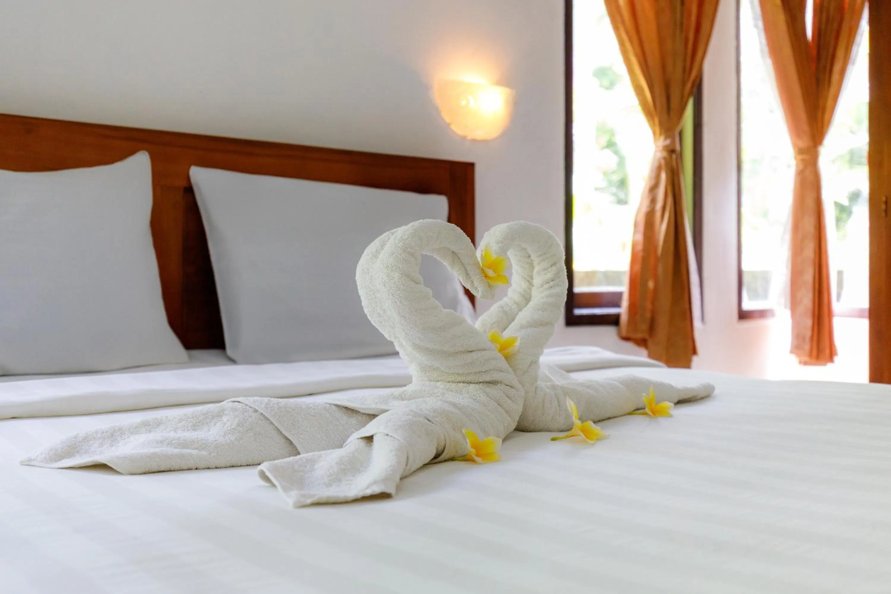 Bed in Nyuh Kadah Guest House