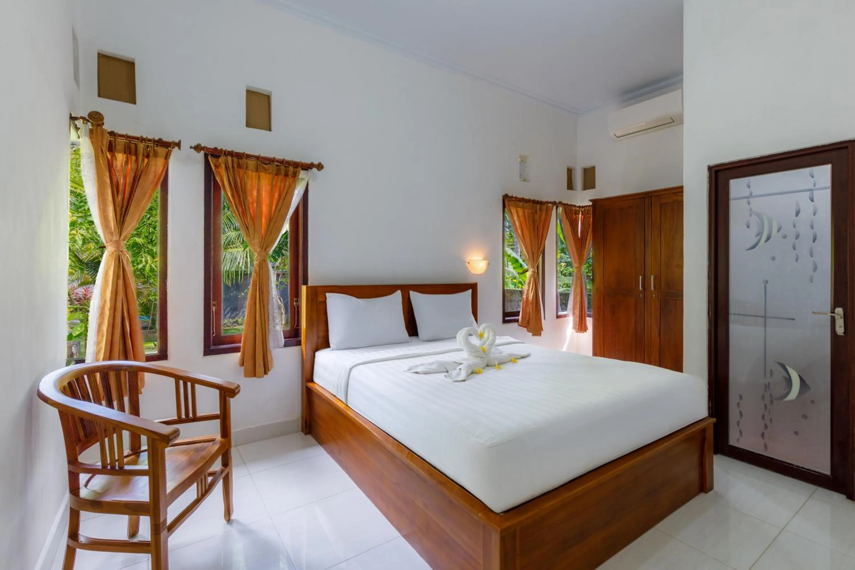 Bed in Nyuh Kadah Guest House