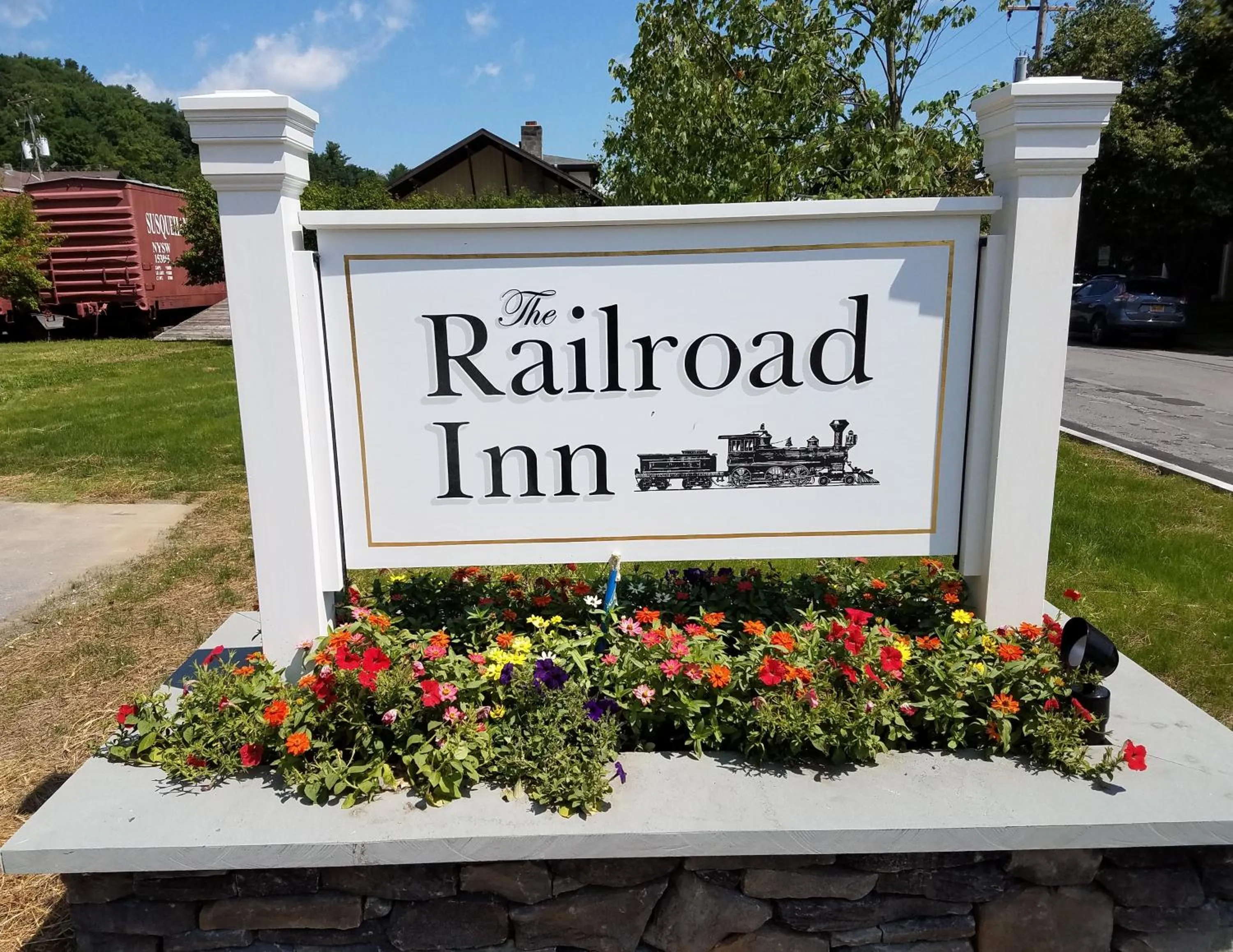 Property logo or sign in The Railroad Inn